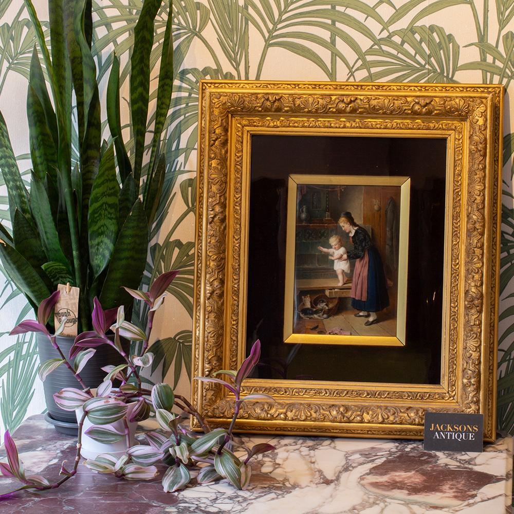 Featuring a Playful Scene 

From our Ceramics collection, we are pleased to offer this KPM Porcelain Plaque Mother and Child. The KPM plaque framed within the original gesso frame with velvet mount and central rectangular porcelain plaque mounted in