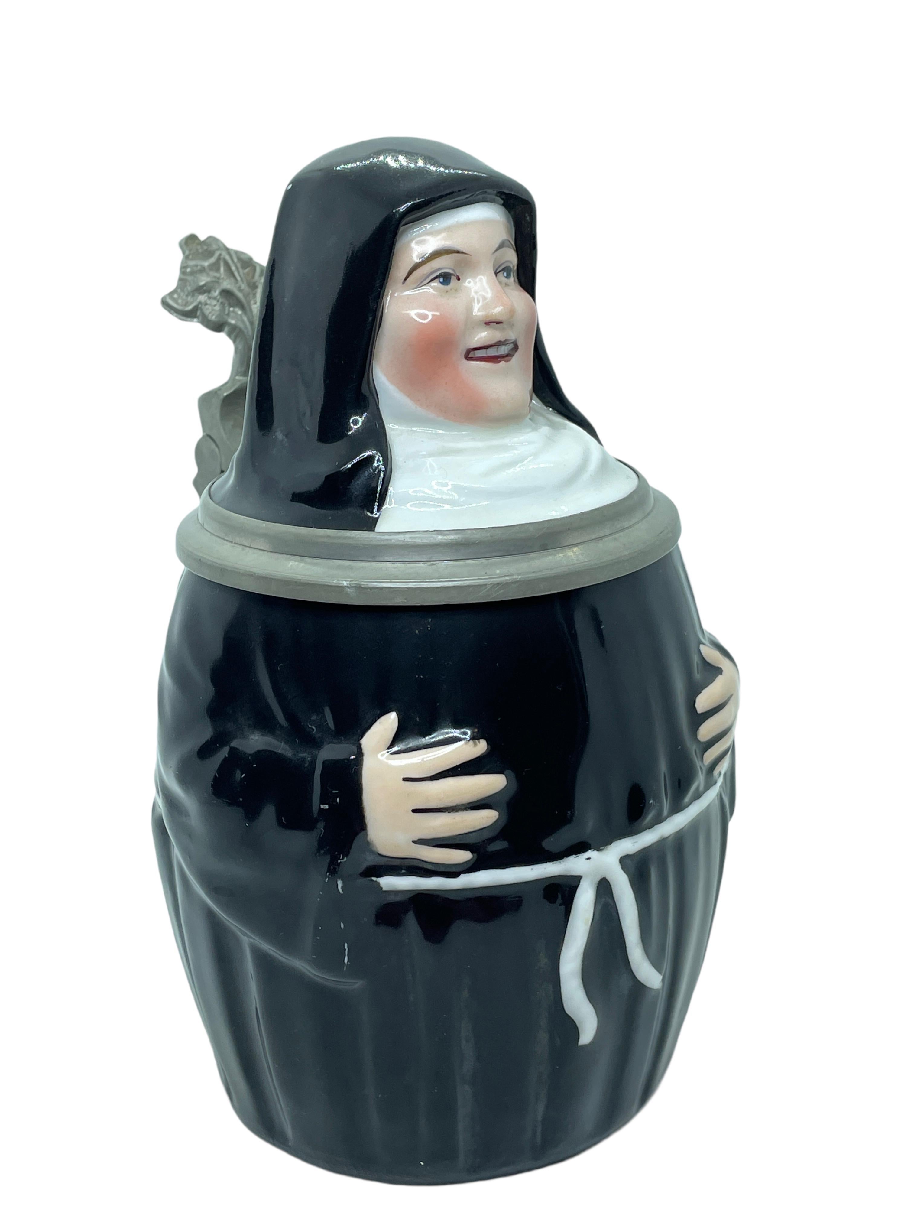A gorgeous character beer stein - Nun. This character beer stein has been made in Germany circa 1900s by E. Bohne, Thuringia Germany. Absolutely gorgeous piece hand painted and still in great condition. Lid works properly. A nice addition to any