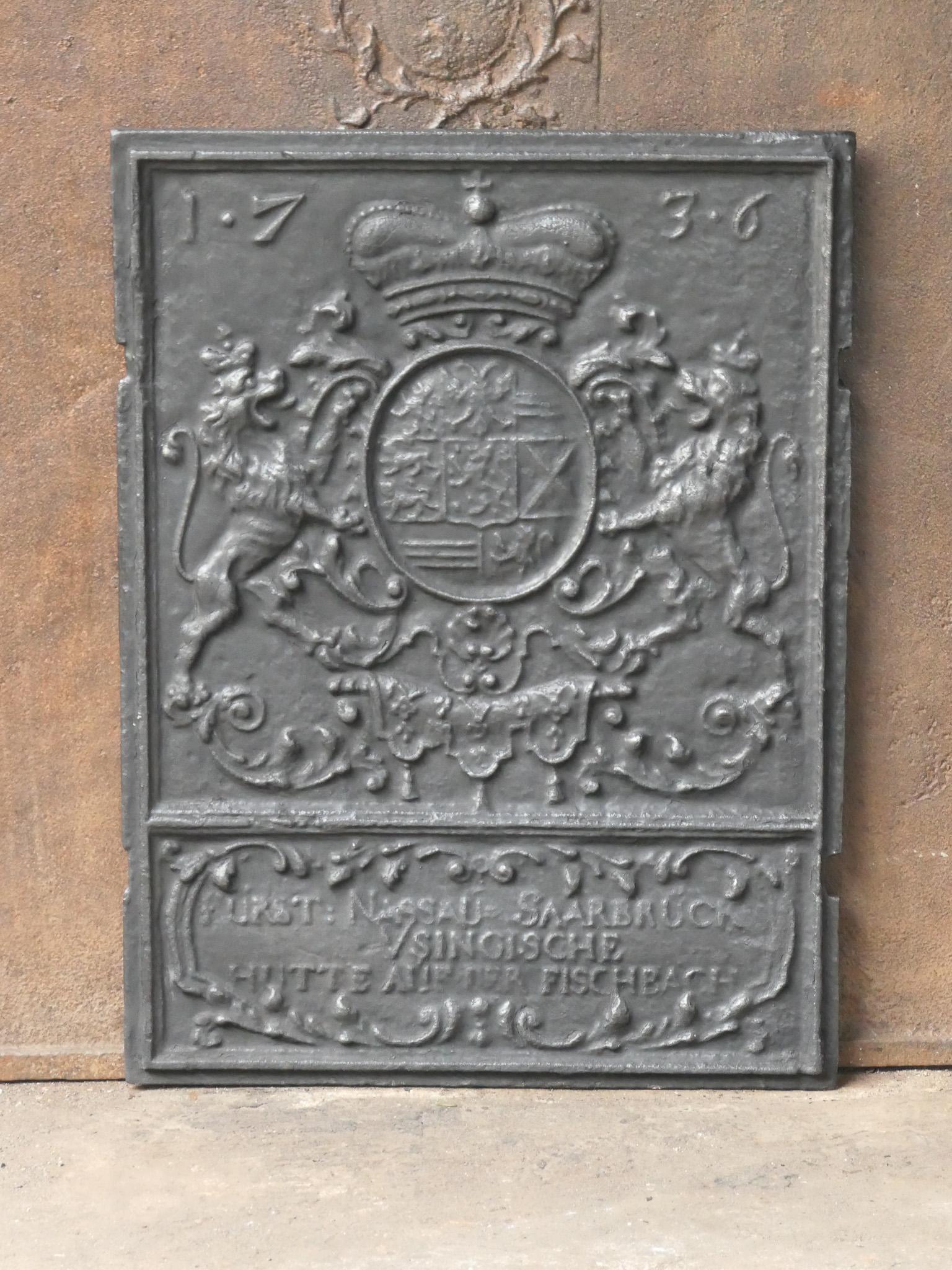 18th century German Louis XV period fireback with a coat of arms.

The fireback is made of cast iron and has a black / pewter patina. It is in a good condition and does not have cracks. 

