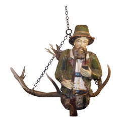 German Lusterweibechen Figural Poly Chromed Hunter w/ Flanking Antlers, C. 1870