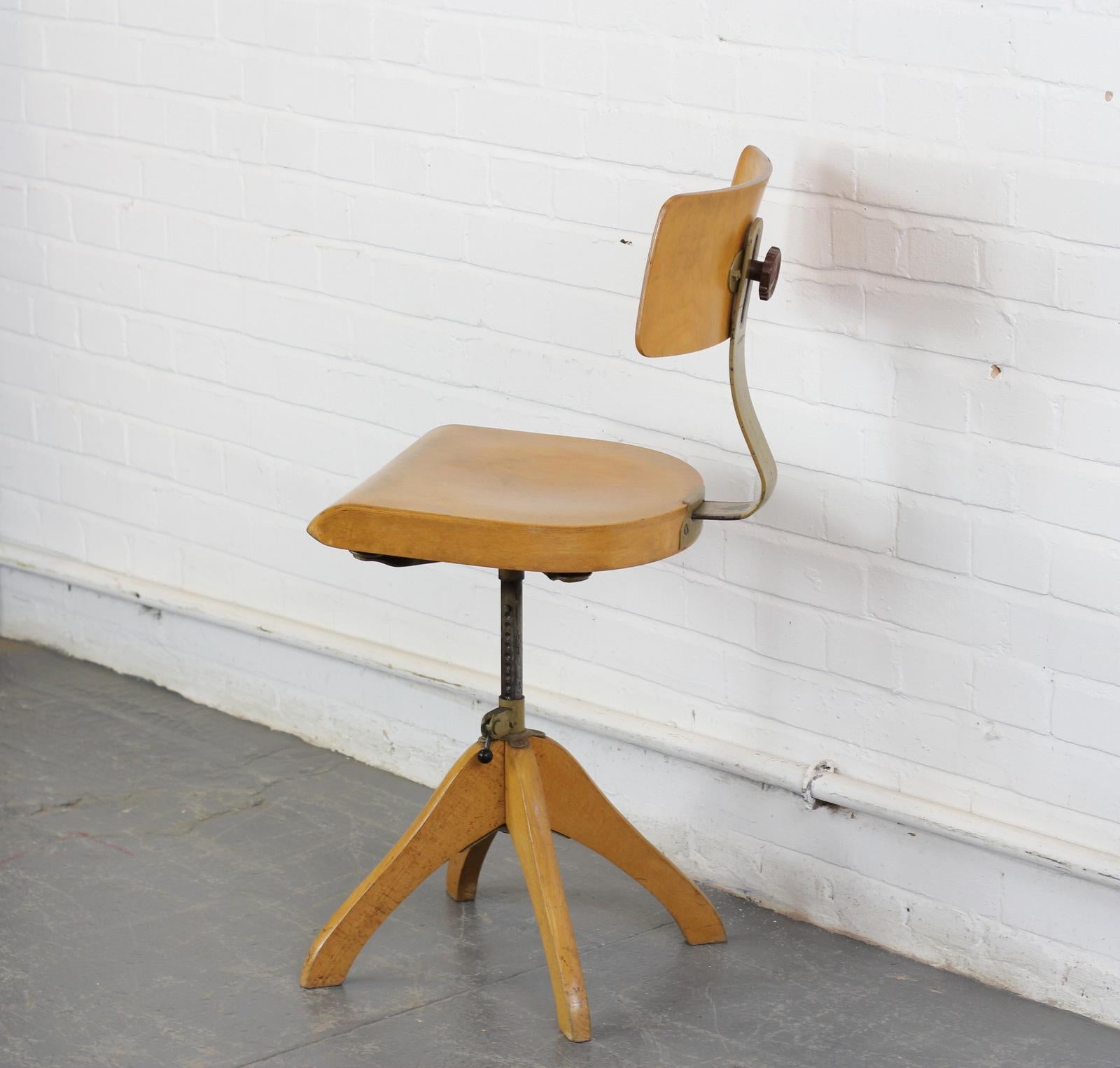 German Machinists chair by Polstergleich, circa 1940s

- Sprung seat and back rest
- Beech seat and back rest
- Height adjustable and turns 360
- German, Circa 1940s
- 40cm wide x 47cm deep x 62cm at it's tallest

Margarete Klöber,