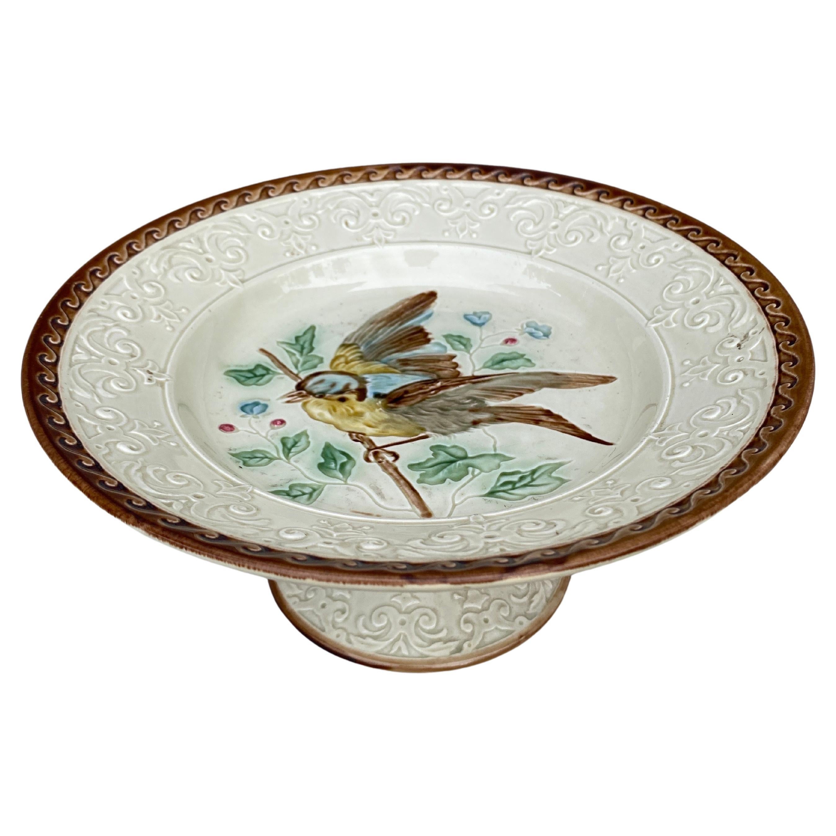 German Majolica Bird Cake Stand Circa 1890.
Bird with a branch and flowers.