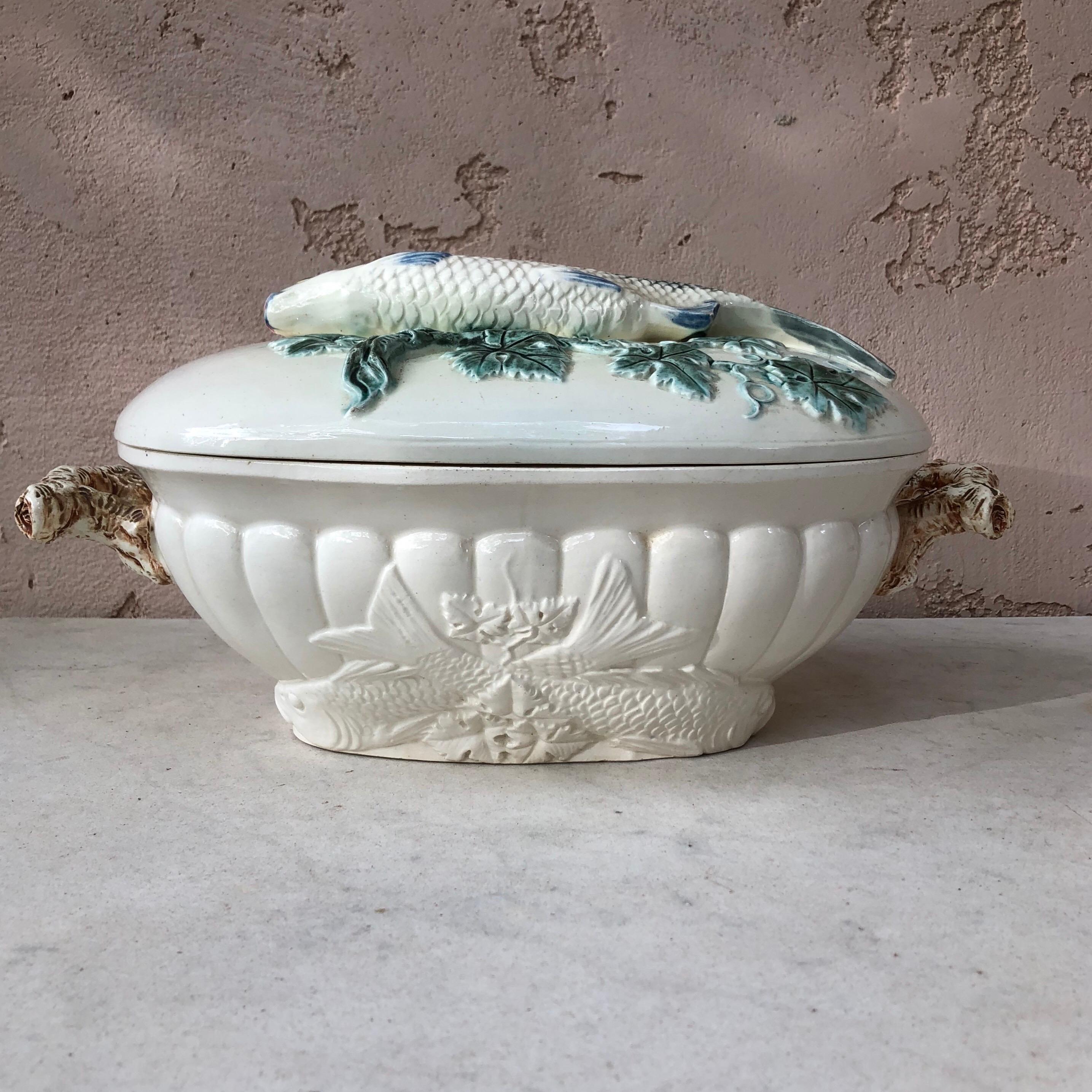 Unusual and rare German Majolica tureen with a fish and leaves on the lid signed Krause, circa 1890.
