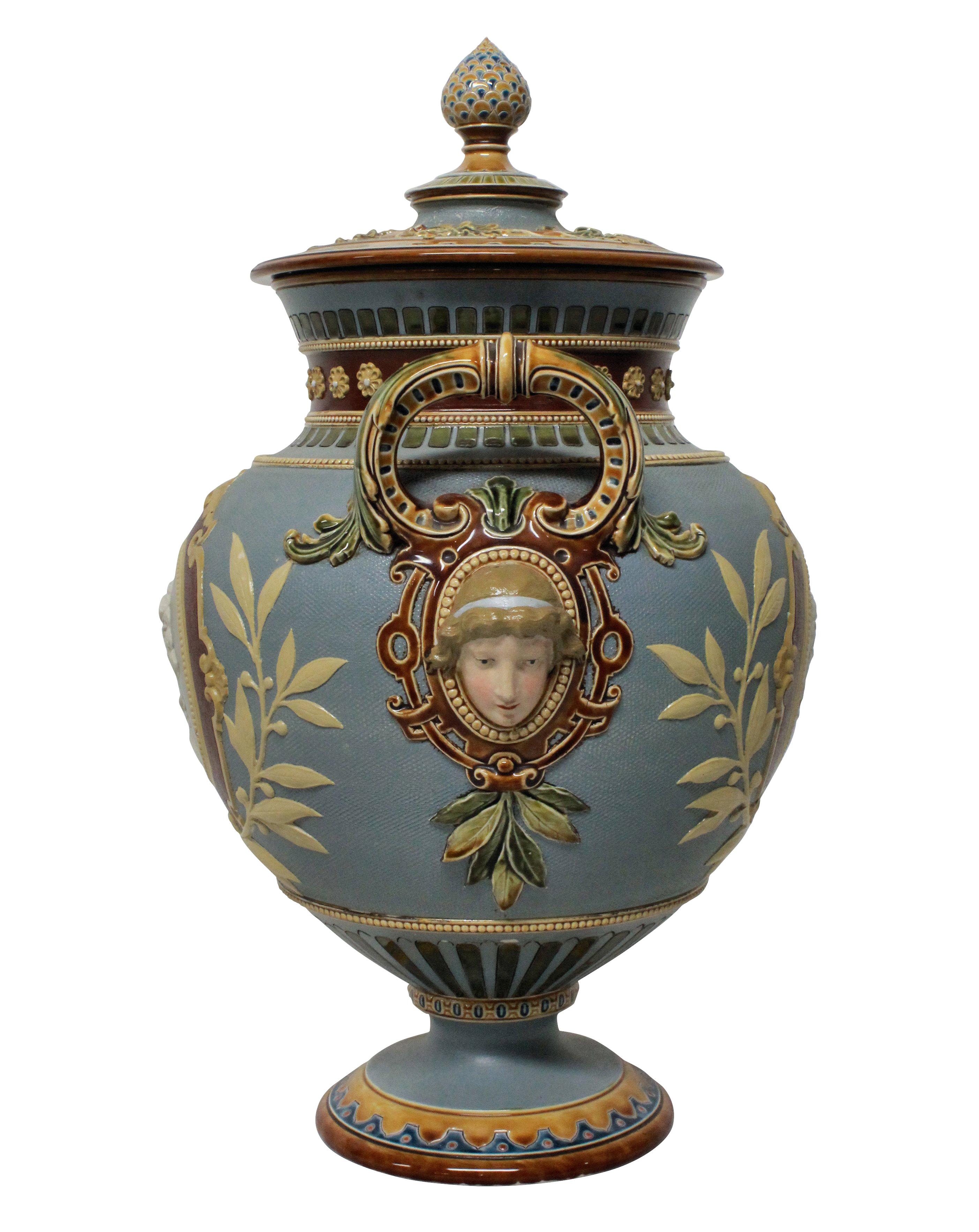 A German Majolica neoclassical tazza with lid, depicting cameos. Signed by Hein.

   