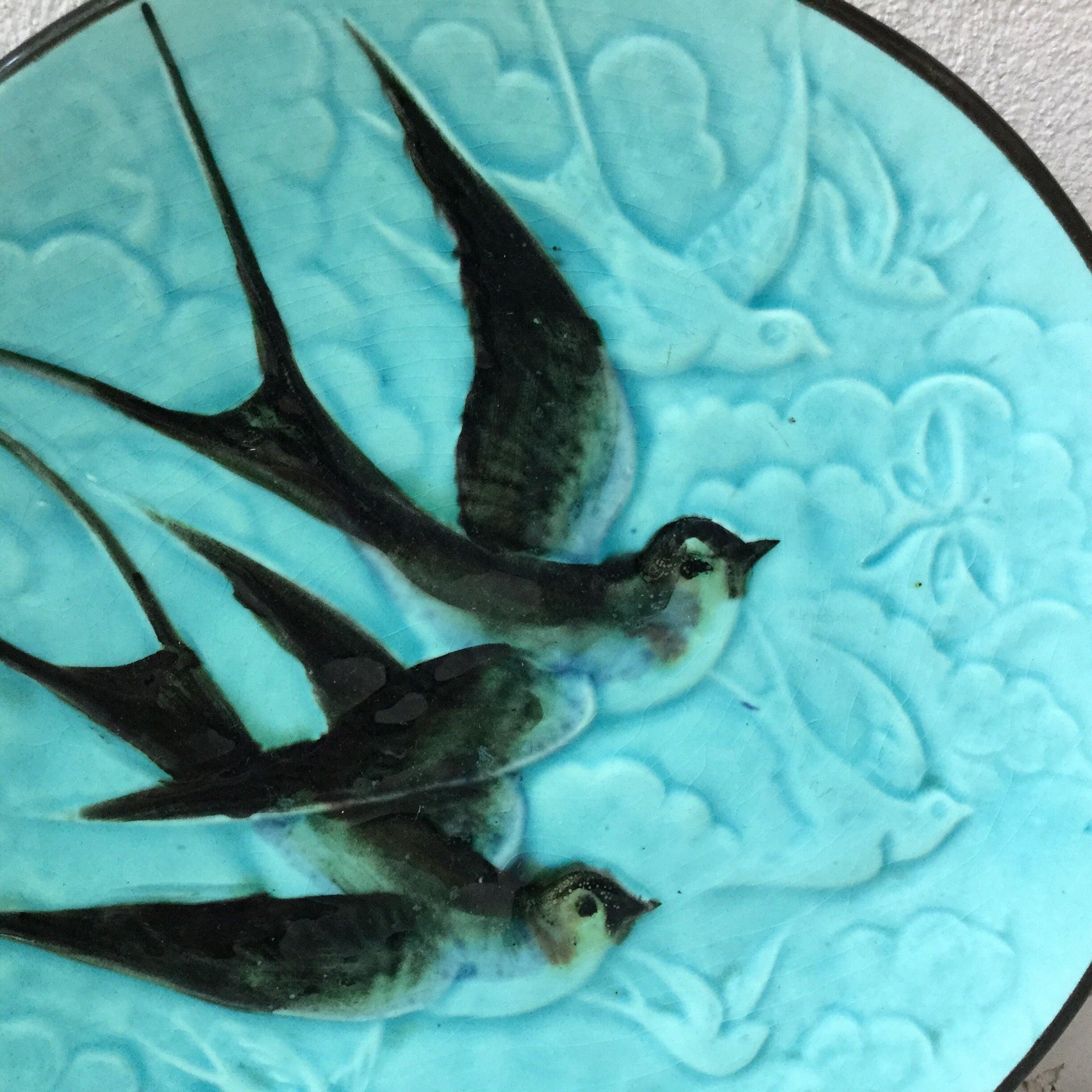 Lovely German majolica aqua plate with bird swallow, circa 1900.
2 plates available.