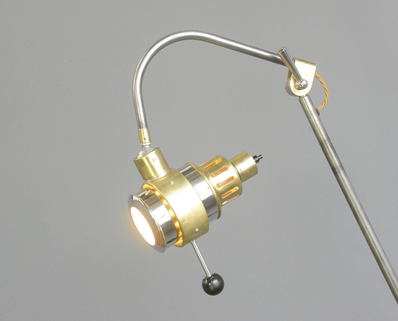 German Medical Wall Lamp Circa 1950s

- Chrome and brass
- On/Off switch on the shade
- Glass lens
- Takes E27 fitting bulbs
- Fully articulated
- German ~ 1950s
- 12cm wide
- Extends up to 100cm from the wall

Condition Report

Fully re wired with