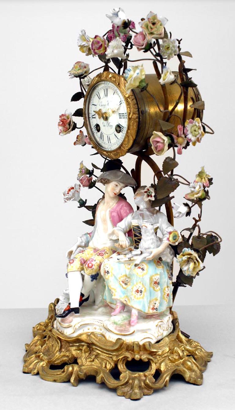 German Meissen (19th Century) porcelain group of men and women with floral and bronze branches around mantel clock (not working)
