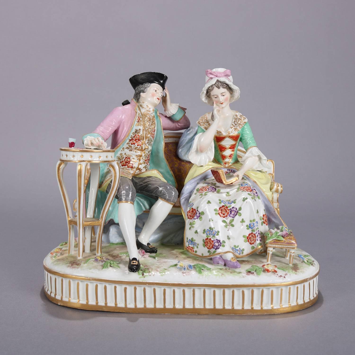 Antique German Meissen School hand-painted porcelain figural group depicts parlour scene with courting couple, gilt highlights throughout, circa 1880.

Measures: 8