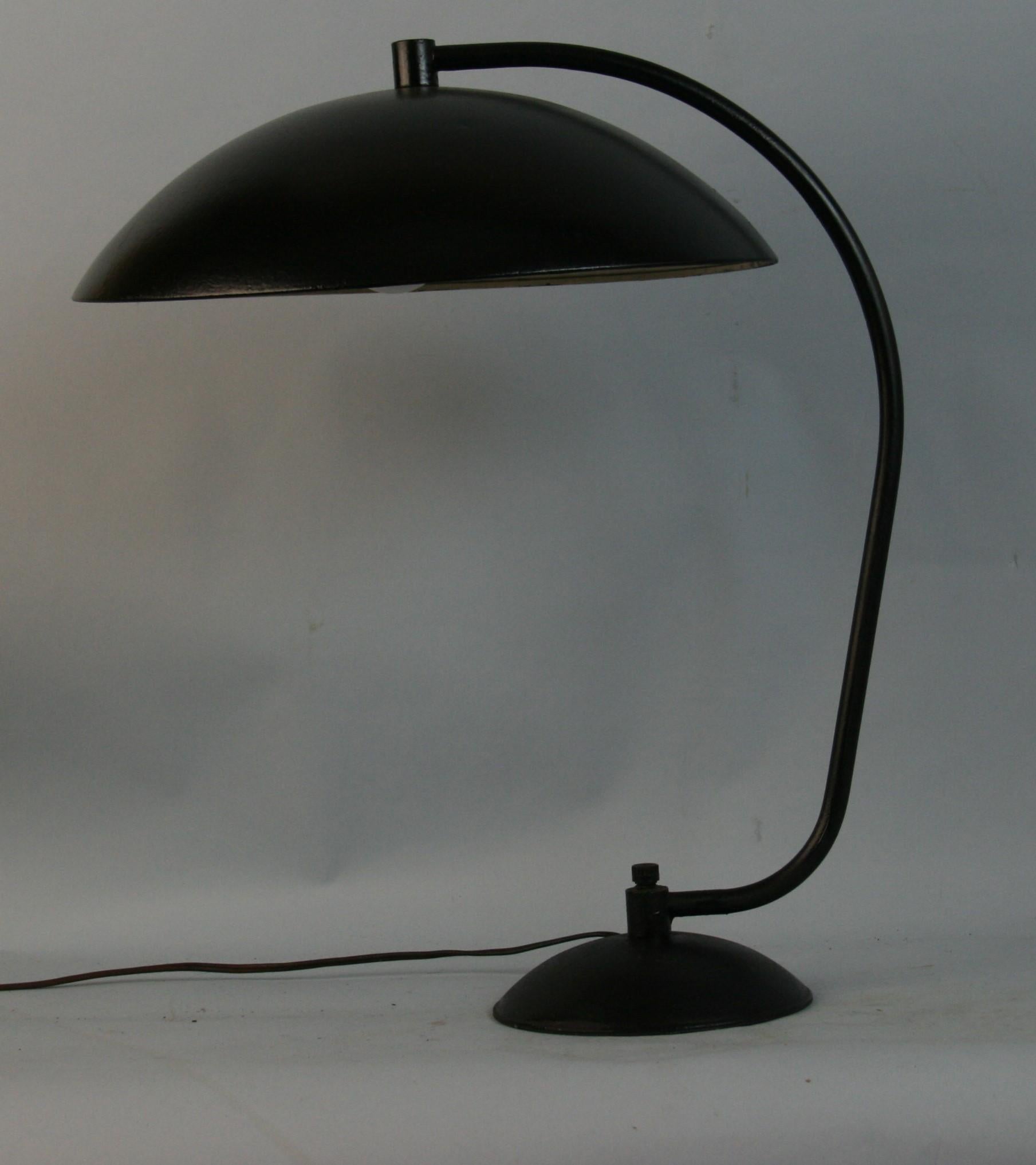 l1270  Mid Century saucer lamp .
Original two light domed table lamp with internal on of switch.
Kurt Versen lamps were selected for MoMA Good Design exhibitions and often selected for use in Case study houses
A classic and functional design in