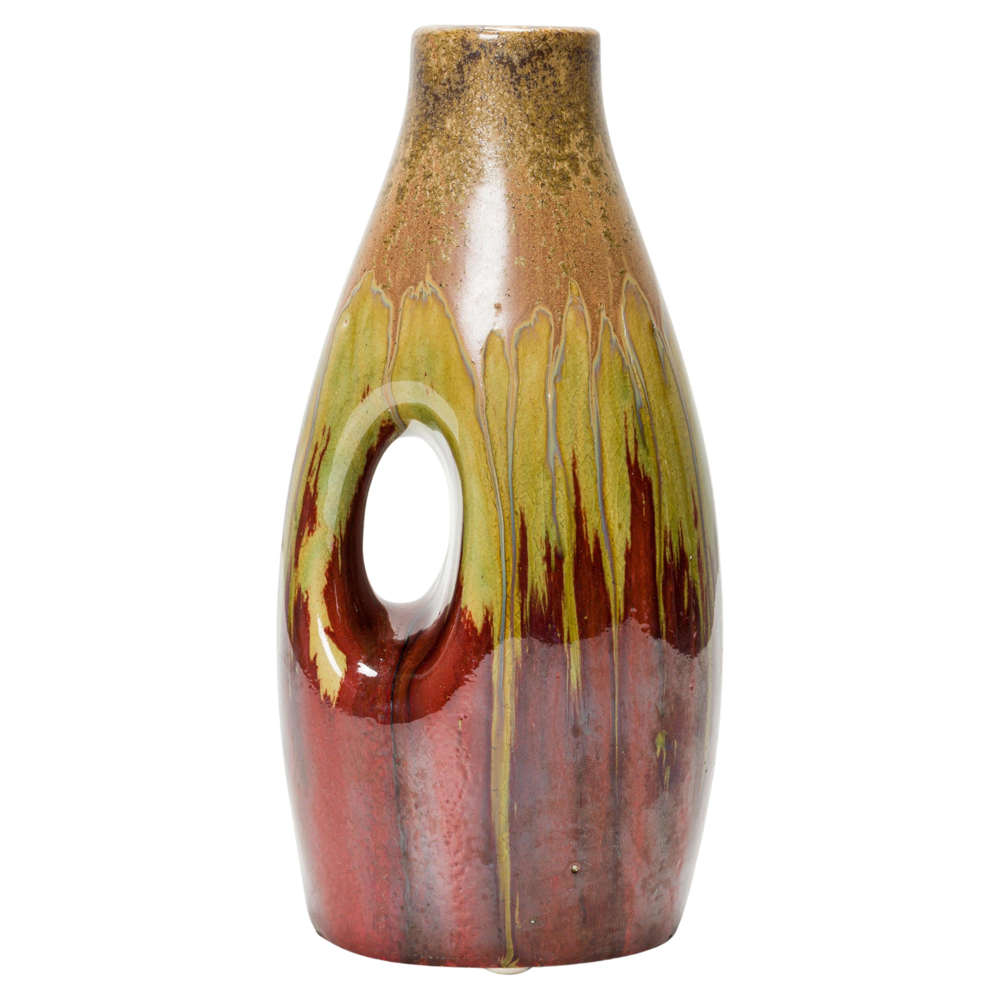 German Mid-Century Beige, Green, and Brown, Drip Glazed Cutout Form Ceramic Vase For Sale