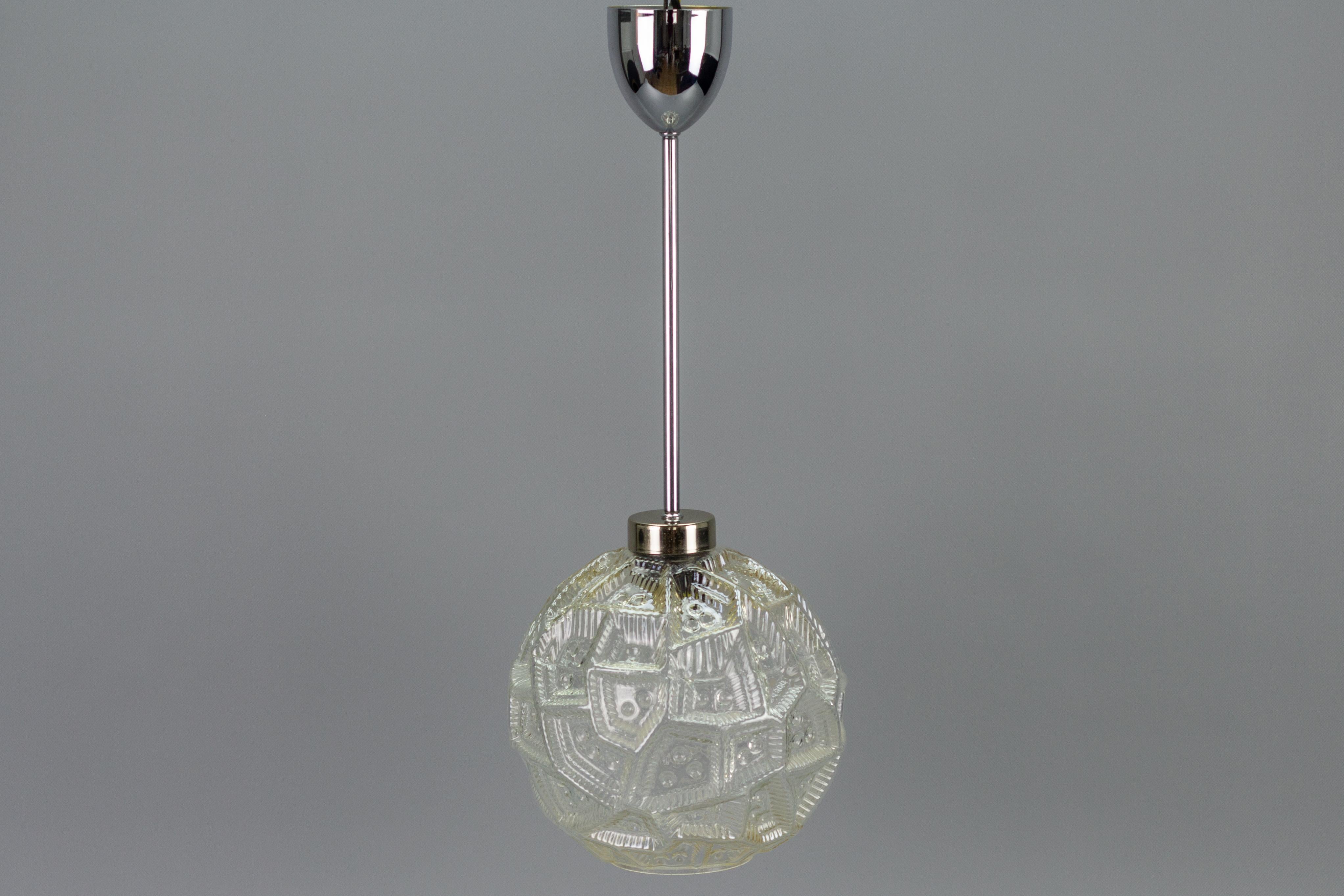 European German Mid-Century Modern Clear Glass Globe and Chrome Pendant Light For Sale