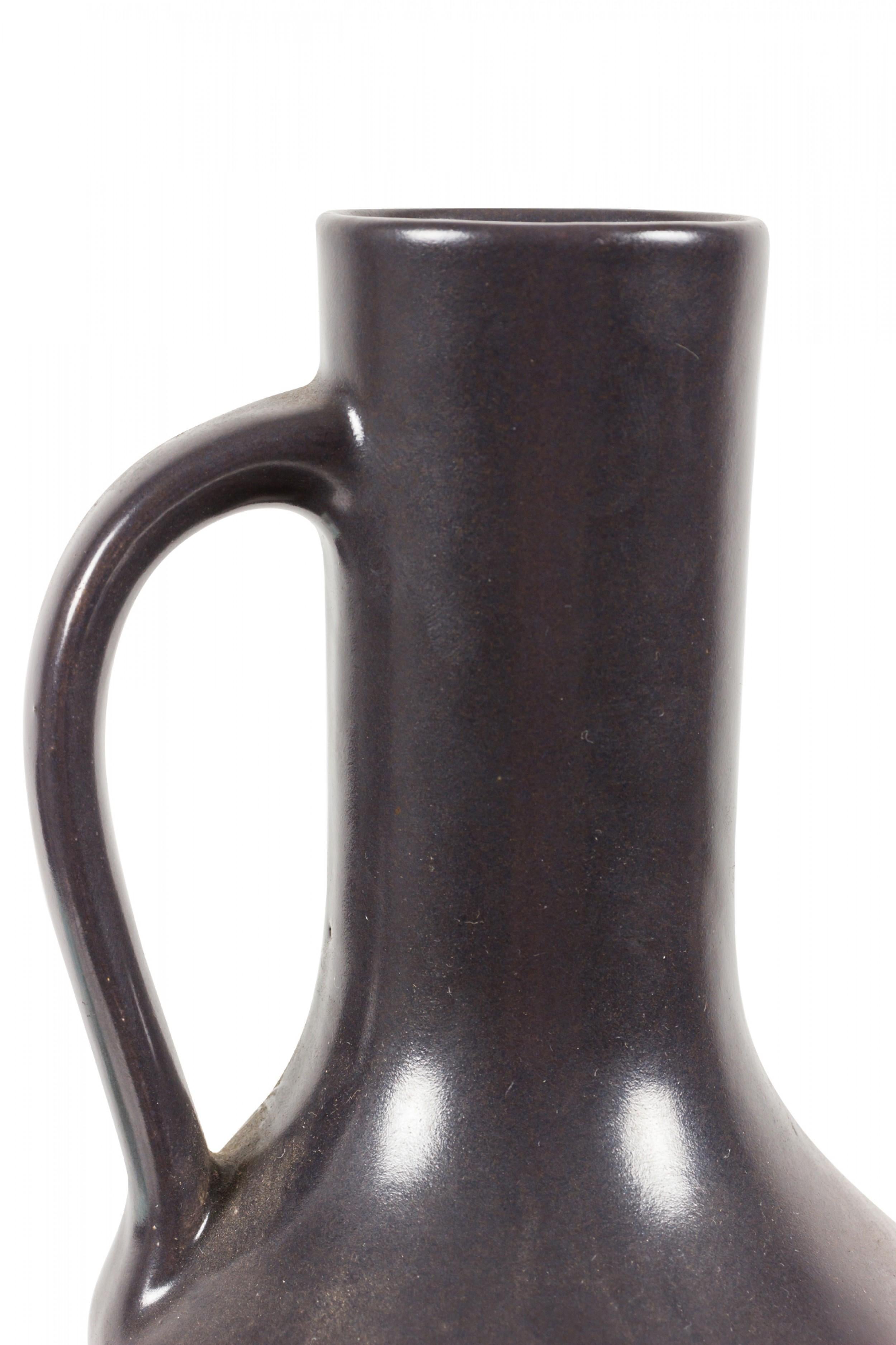 German Mid-Century Vertical Vine Design Black Glazed Ceramic Handled Vase In Good Condition For Sale In New York, NY