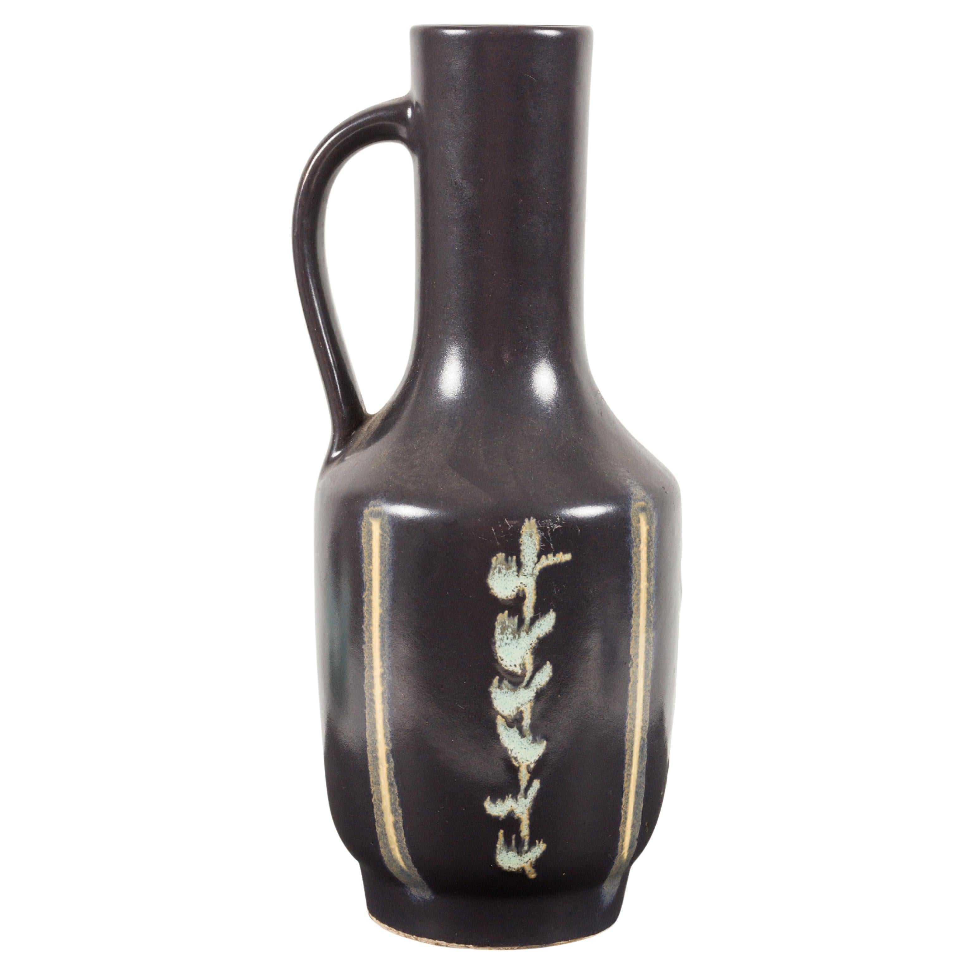 German Mid-Century Vertical Vine Design Black Glazed Ceramic Handled Vase For Sale