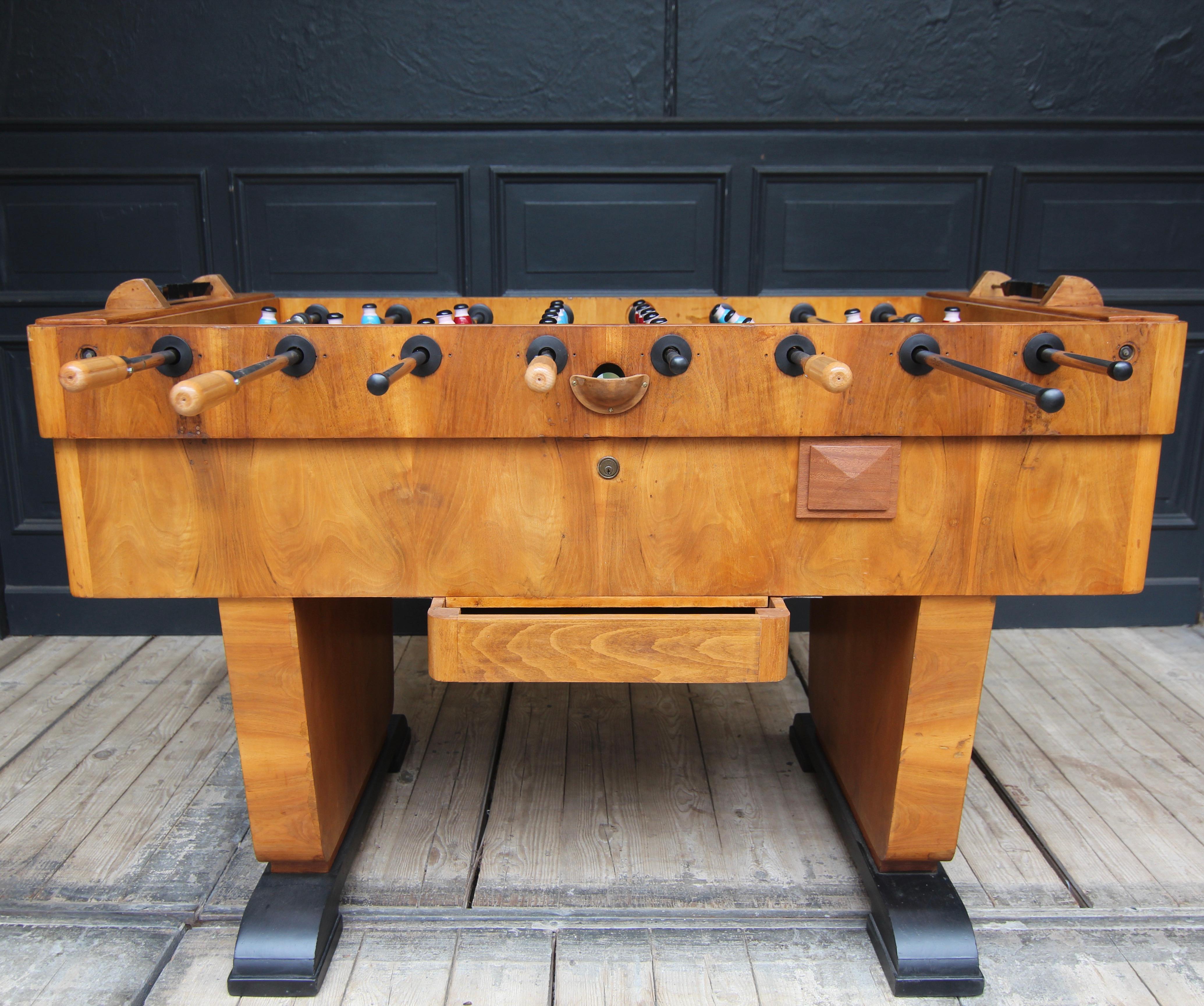 German 50s foosball table. Attributable to the manufacturer Leonhart, who has stood for the best quality and innovation in the field of foosball tables since the founding of the family business in 1949.

Restored condition. Among other things, the