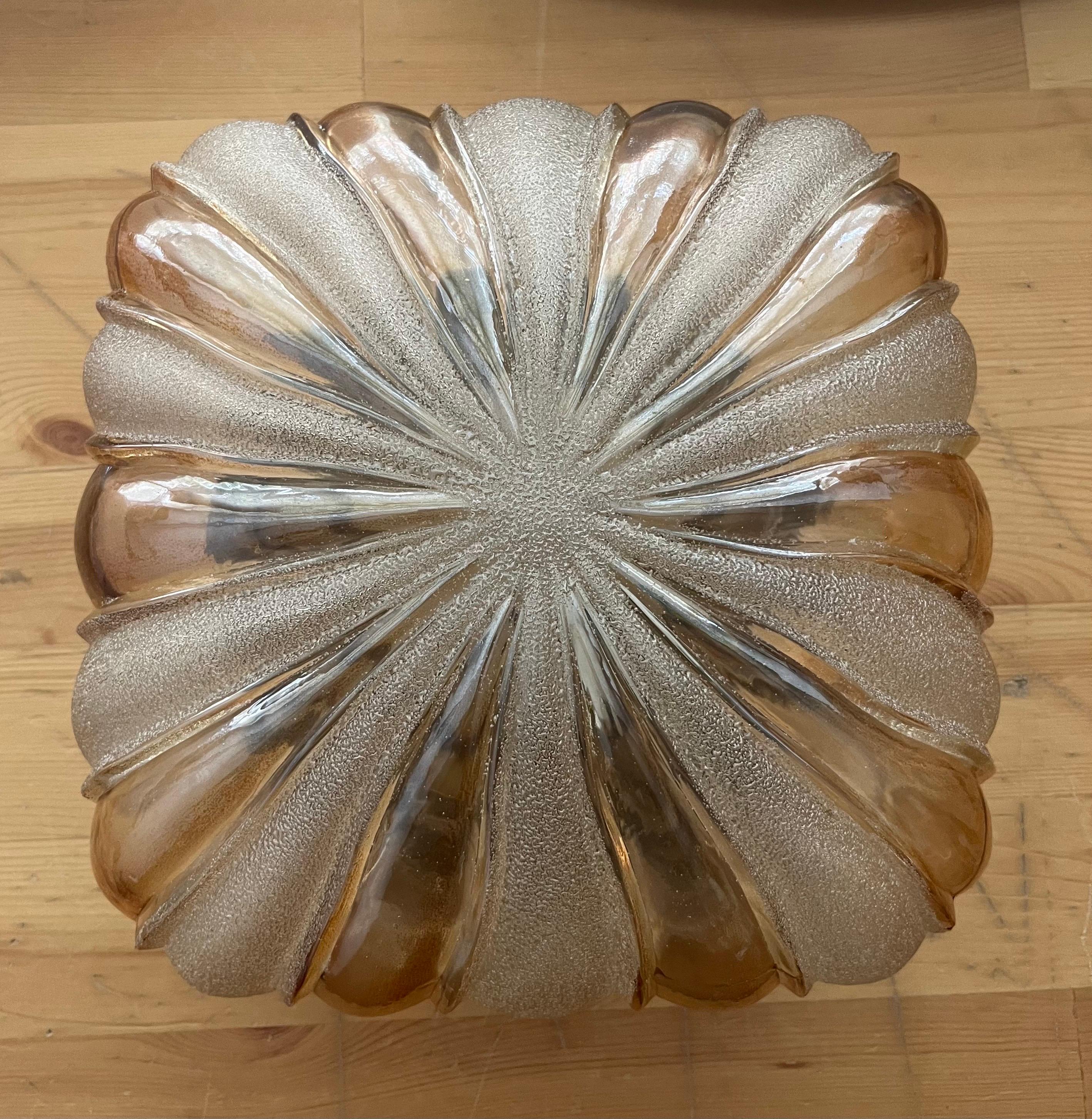Beauty and pretty Set of Three Murano glass Wall Sconces or Flush Mounts by WILA Leuchten. These fixtures were designed and manufactured during the 1970s in Germany. Model 794.
Each Wall Sconce is composed metal structure and a piece of glass. 
Each