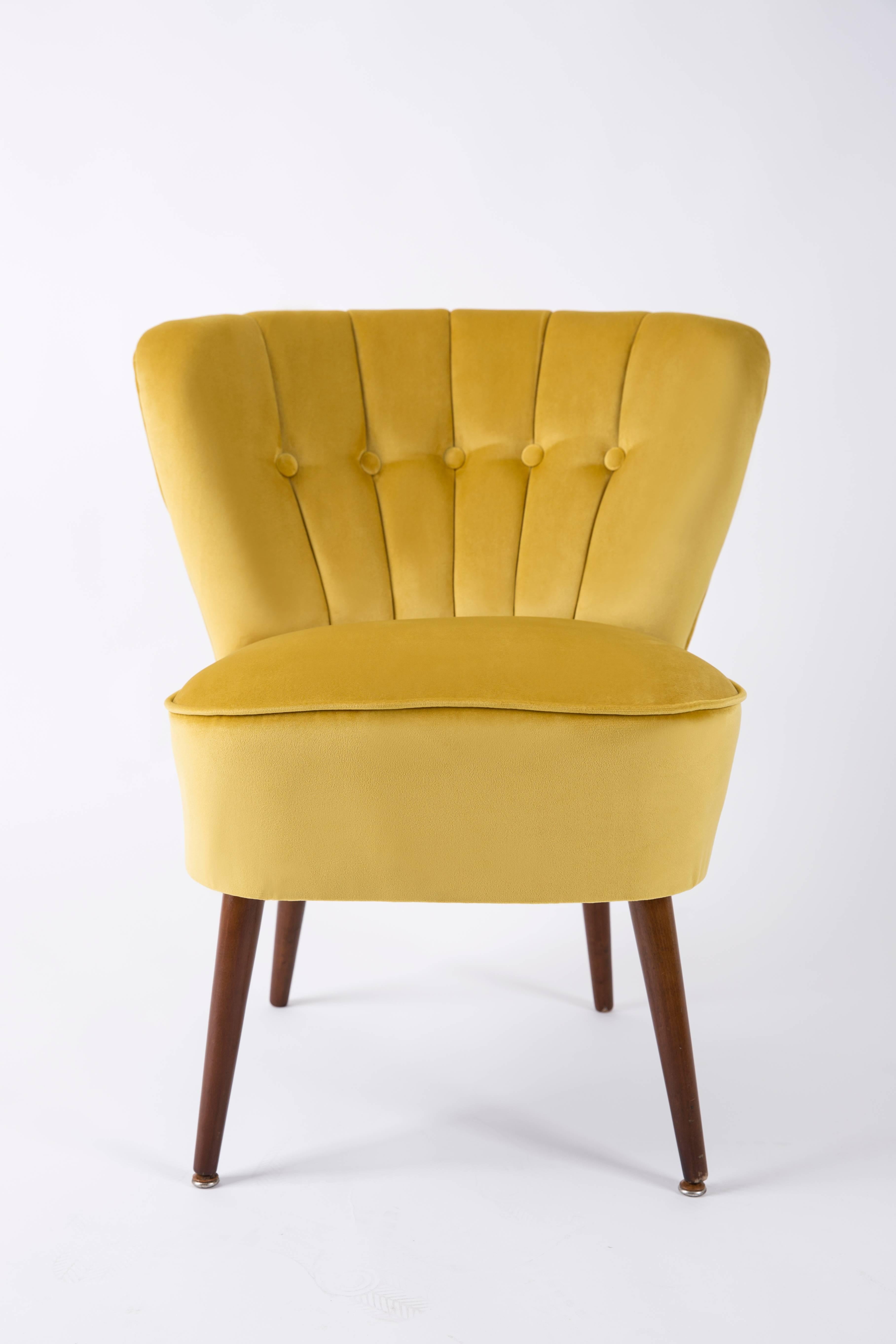 Springy, very comfortable and stabile polish club seat. Produced in the 1960s at the Karl Lindner factory in Germany. The whole armchair is covered with high-quality velour. The armchair is after a complete upholstery and carpentry renovation.

We