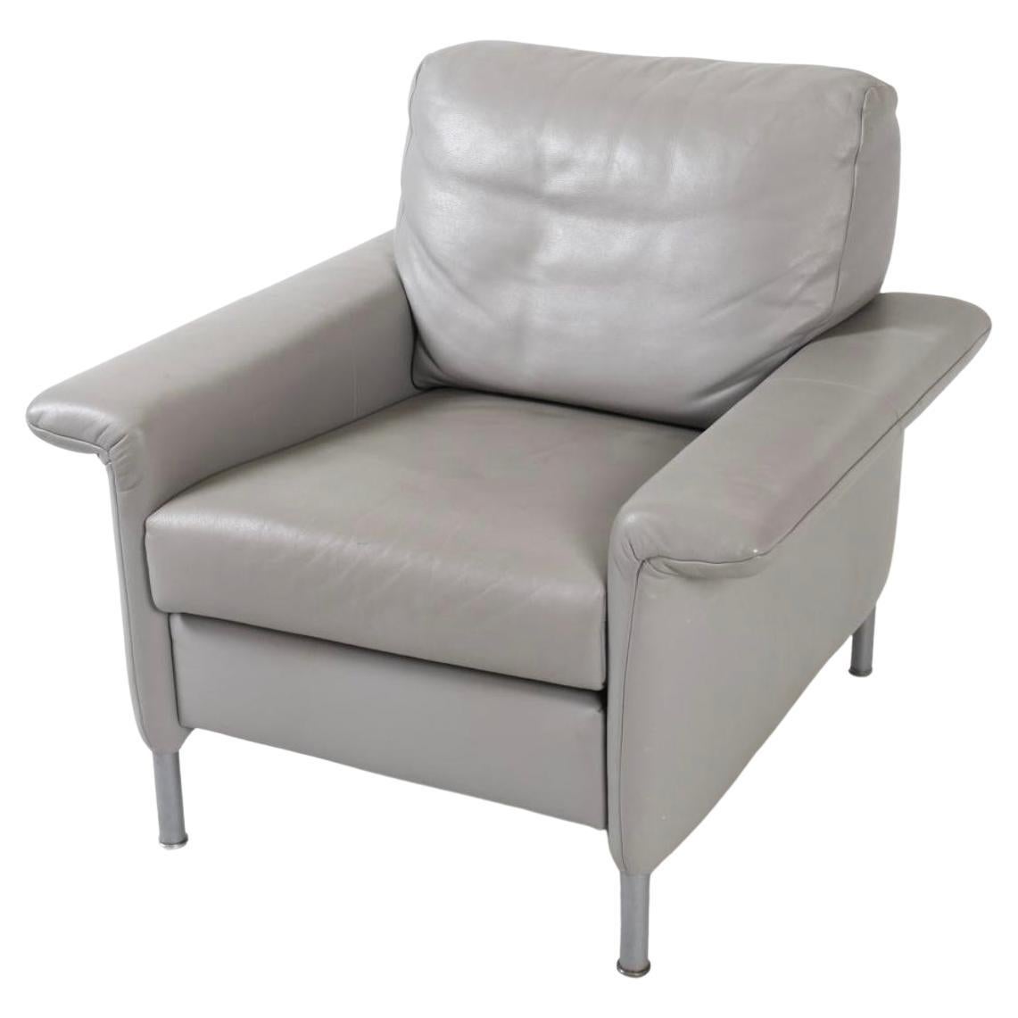 German Modern Gray Leather armchair by Rolf Benz BMP. Light grey tone leather chair featuring metal legs dating to the early 2000s comes with a tag marked 'bmp'. Good Pre Owed Condition. Made in Germany.

Dimensions: H 29