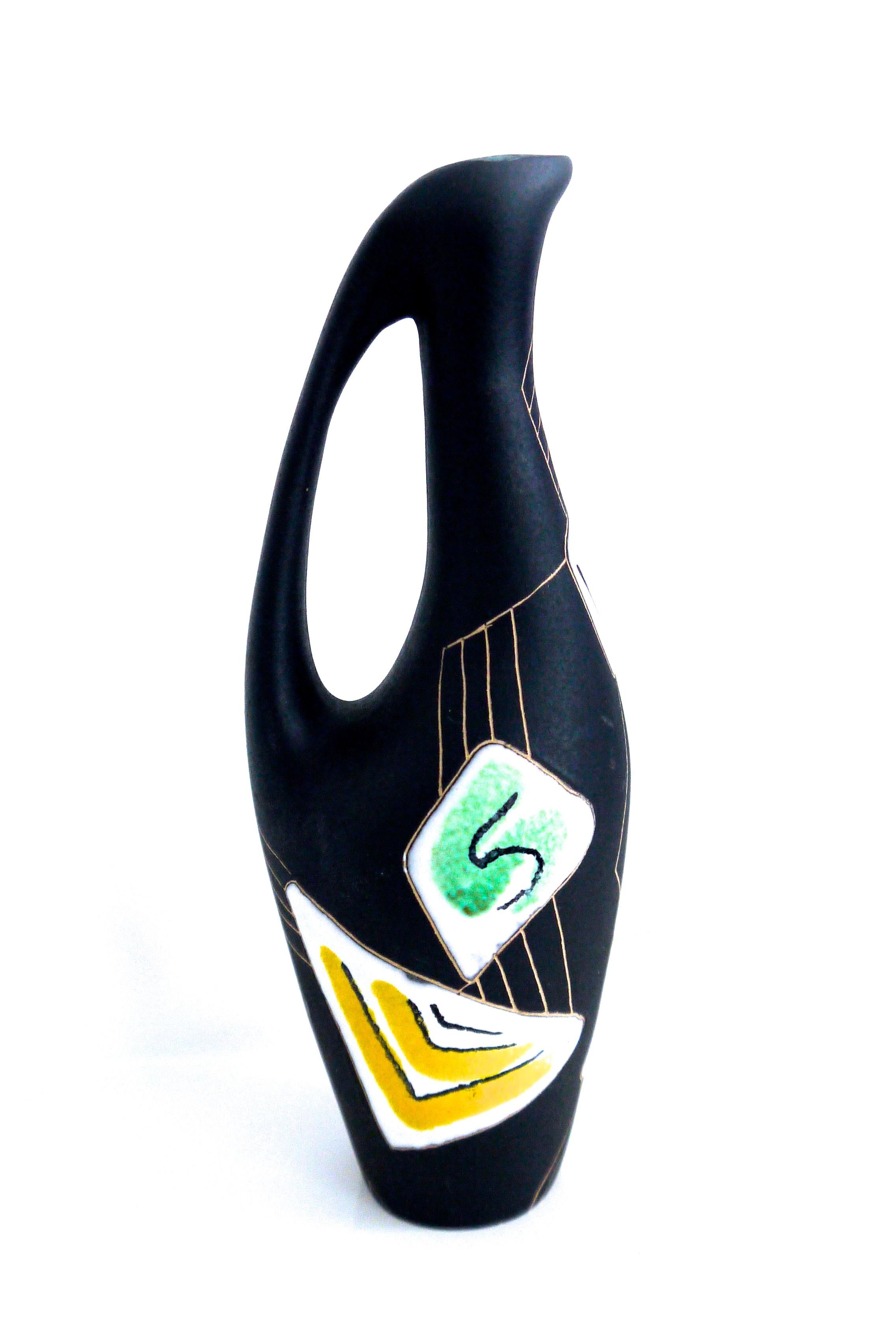 German Modernist hand painted ceramic pitcher (small) 'Morroco' design 1950s for Ruscha ceramic. Hand painted with black matte glaze as background. The second vase (purchased separately) is fired glaze and glossy made in Germany label to base