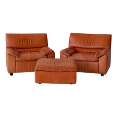 Orangefarbene Leder-Loungesessel + Ottomane von Dreipunkt