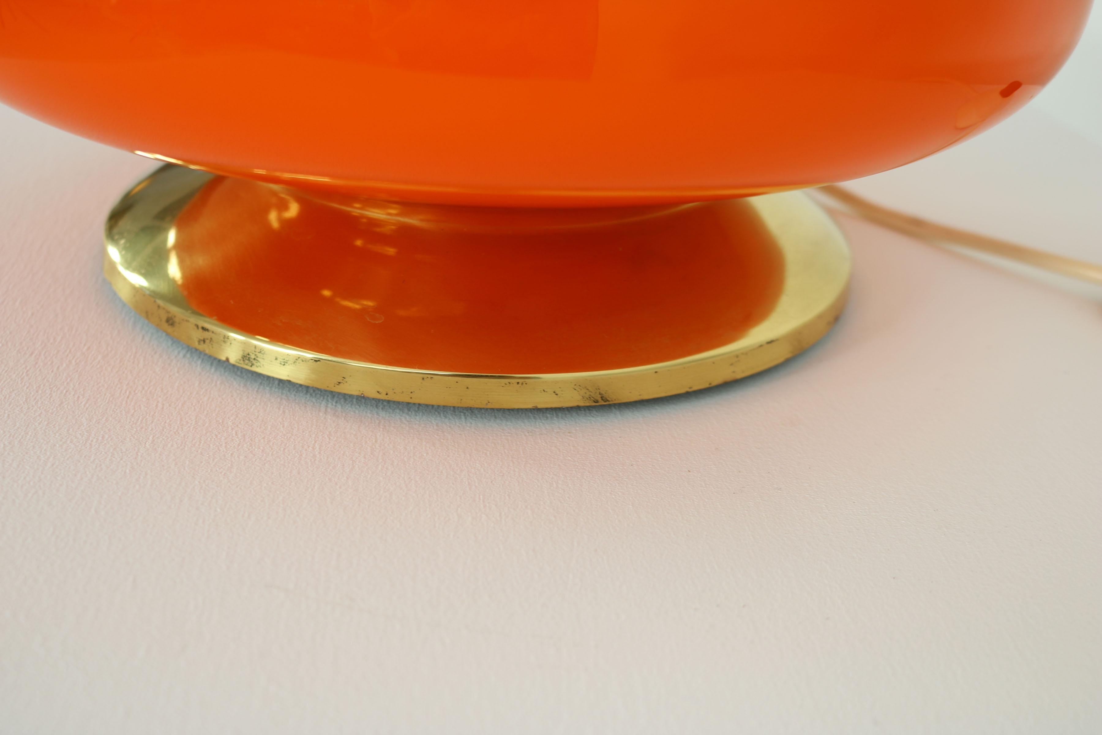 German orange This floor lamp was made in the 70s. It co1970s Floor - Table Lamp For Sale 6