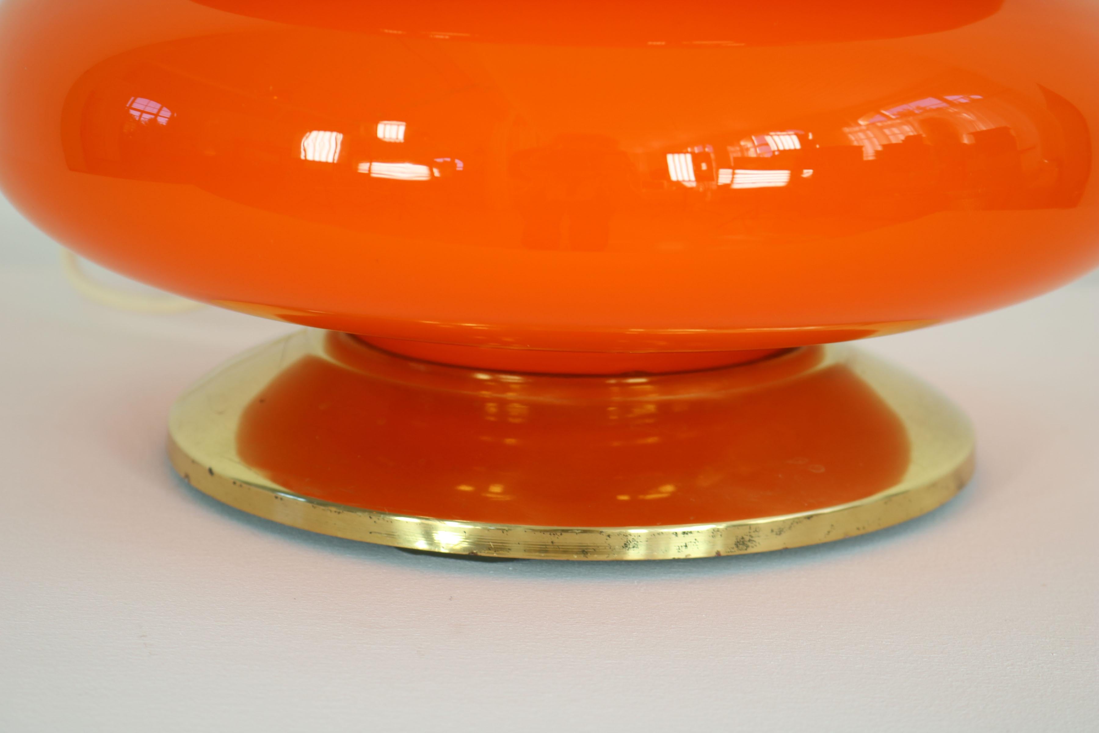 German orange This floor lamp was made in the 70s. It co1970s Floor - Table Lamp For Sale 6