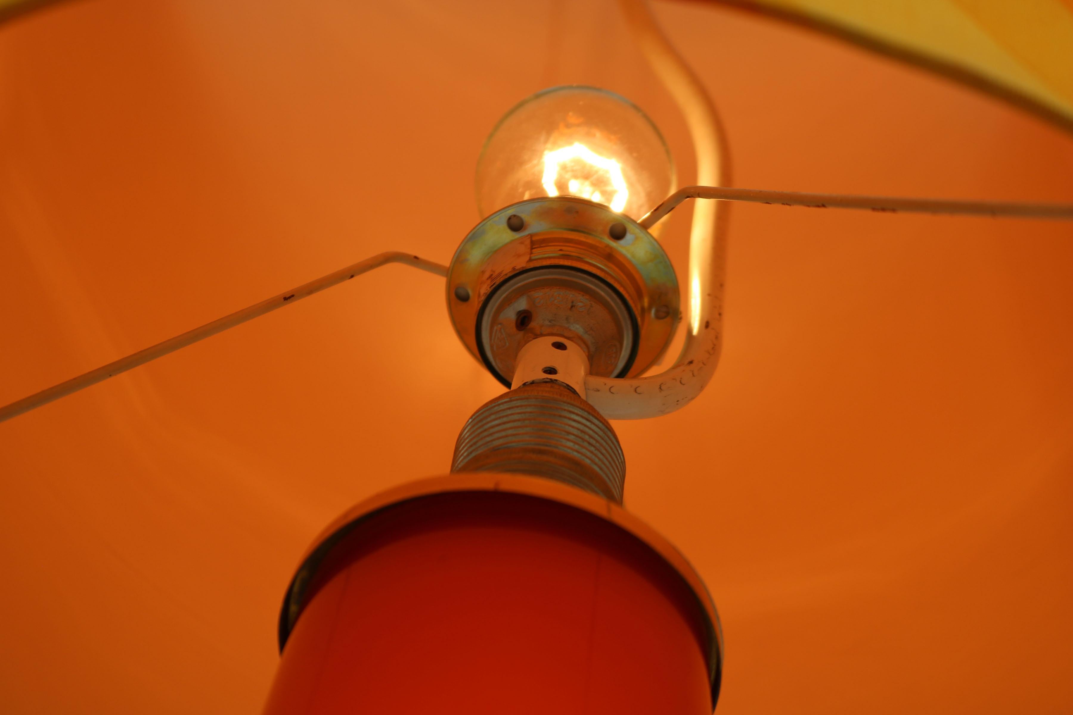 German orange This floor lamp was made in the 70s. It co1970s Floor - Table Lamp For Sale 11