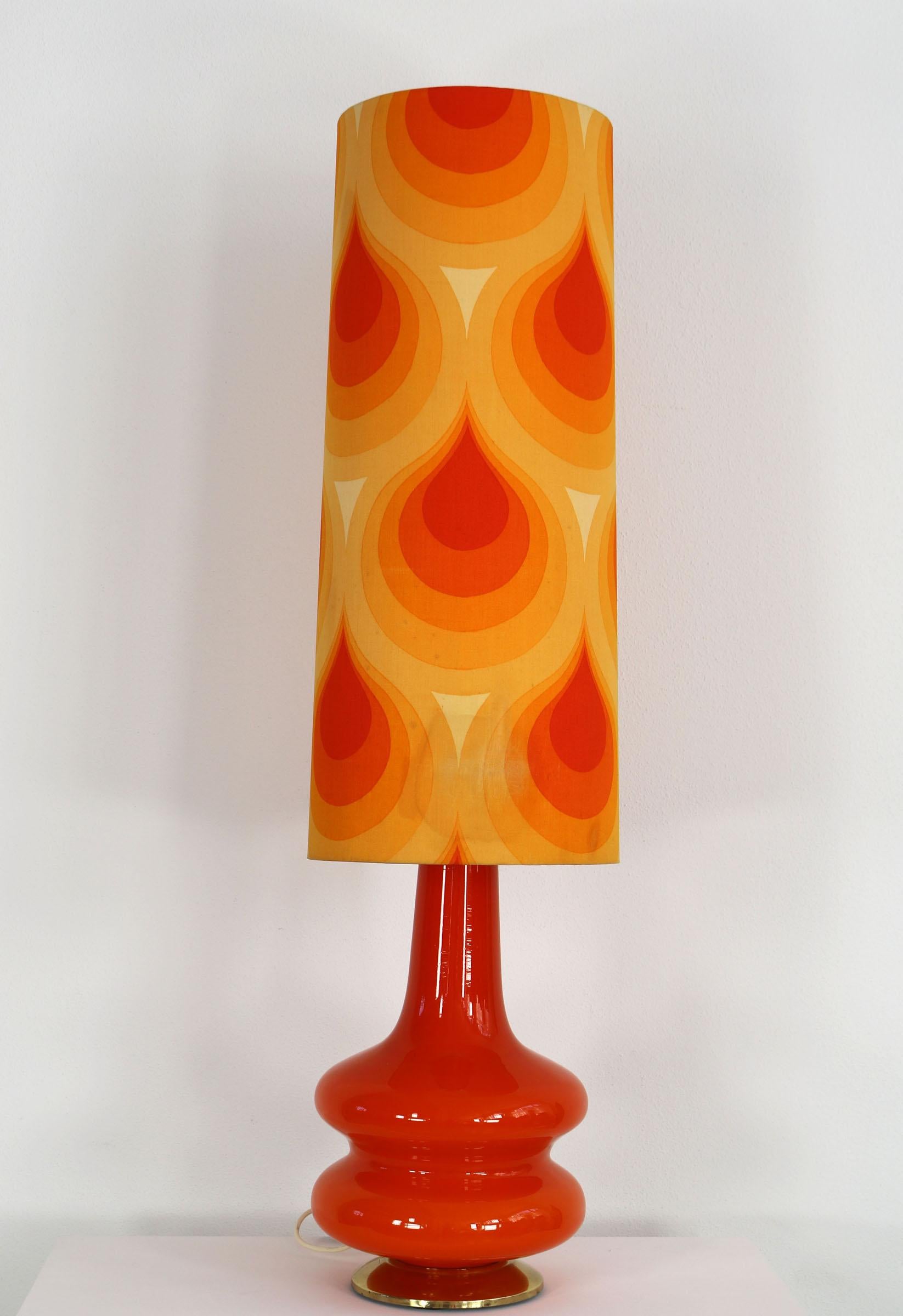 Mid-Century Modern German orange This floor lamp was made in the 70s. It co1970s Floor - Table Lamp For Sale