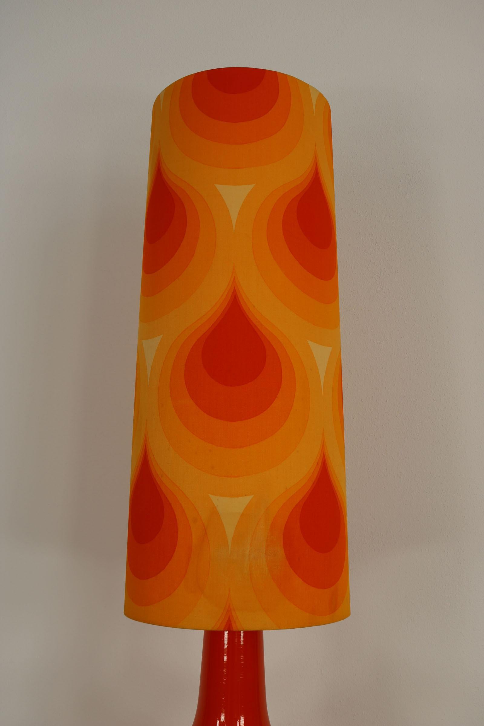 Mid-Century Modern German orange This floor lamp was made in the 70s. It co1970s Floor - Table Lamp For Sale