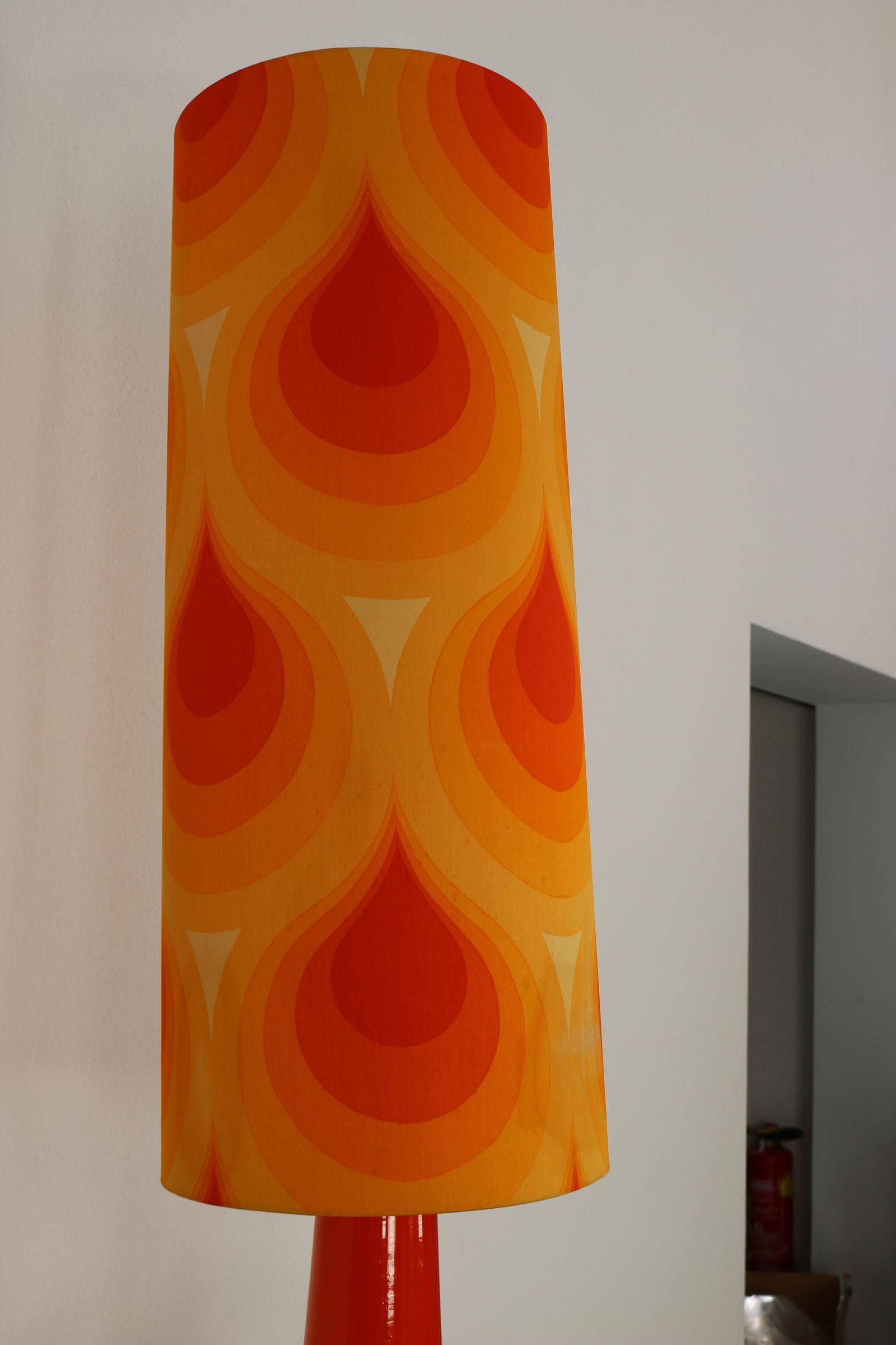 Late 20th Century German orange This floor lamp was made in the 70s. It co1970s Floor - Table Lamp For Sale