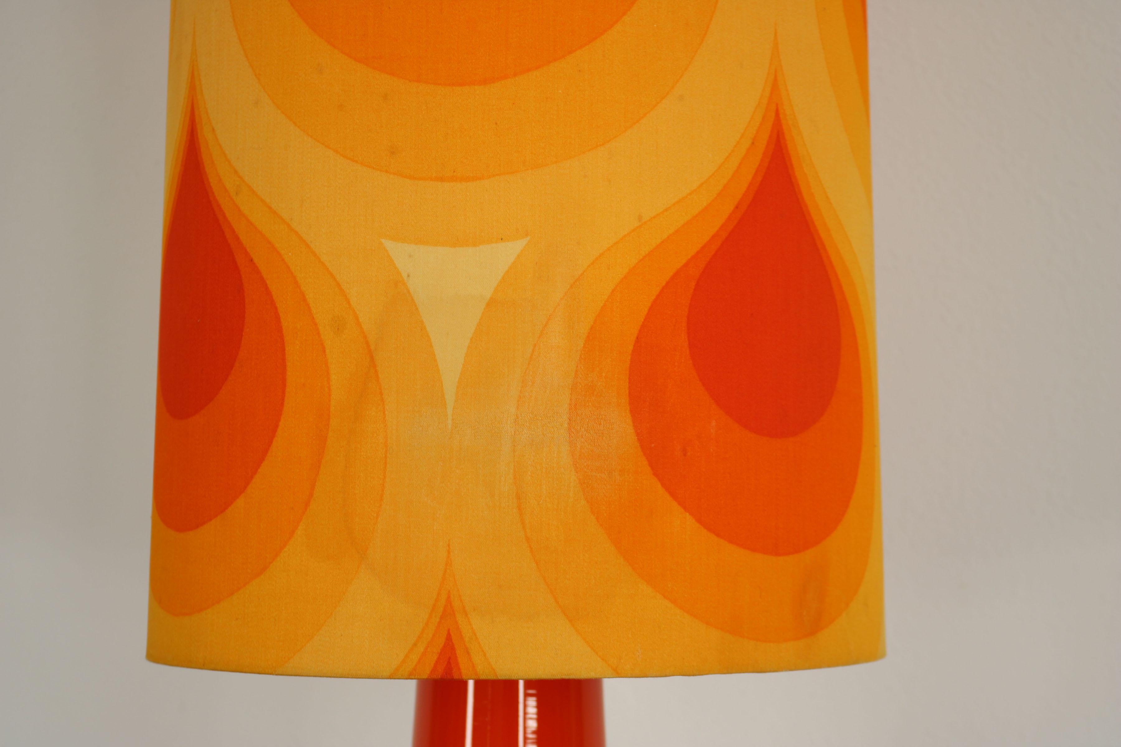 German orange This floor lamp was made in the 70s. It co1970s Floor - Table Lamp For Sale 1