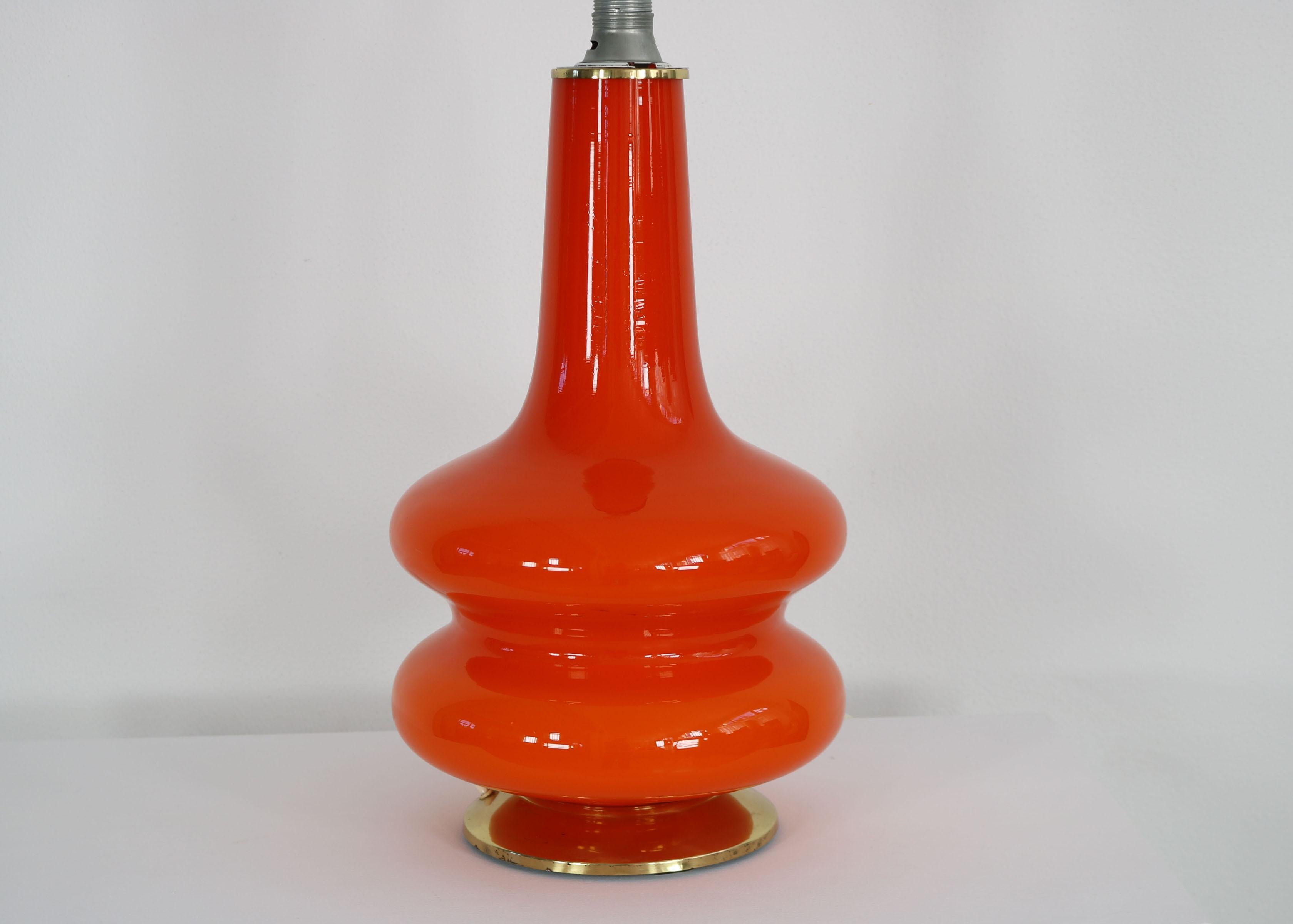 German orange This floor lamp was made in the 70s. It co1970s Floor - Table Lamp For Sale 2