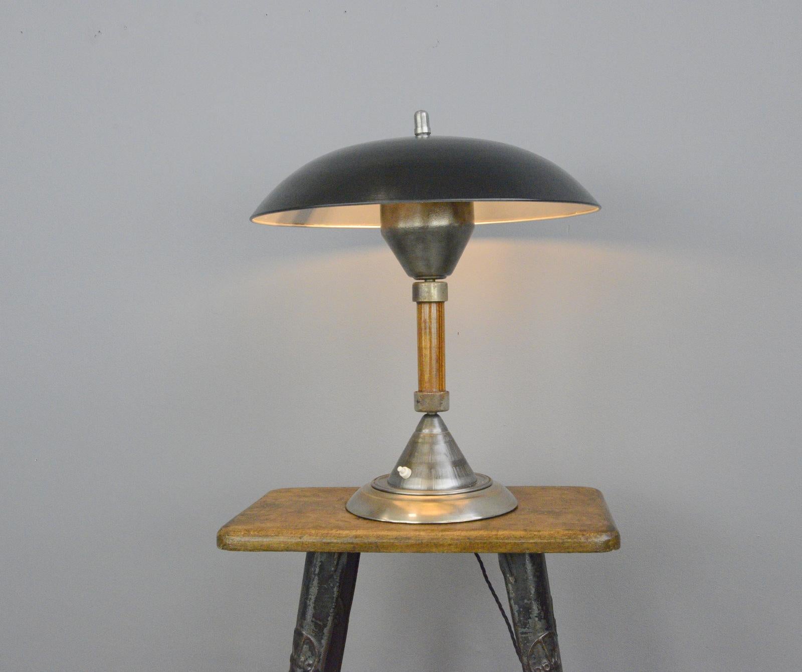 German Panzerfaust table lamp by Kaiser, circa 1940s

- Turned steel shade
- On/Off switch on the base
- Takes E27 fitting bulbs
- Made by Kaiser
- German, 1940s
- Measures: 46cm wide x 50cm tall

Panzerfaust lamp

The Panzerfaust lamp