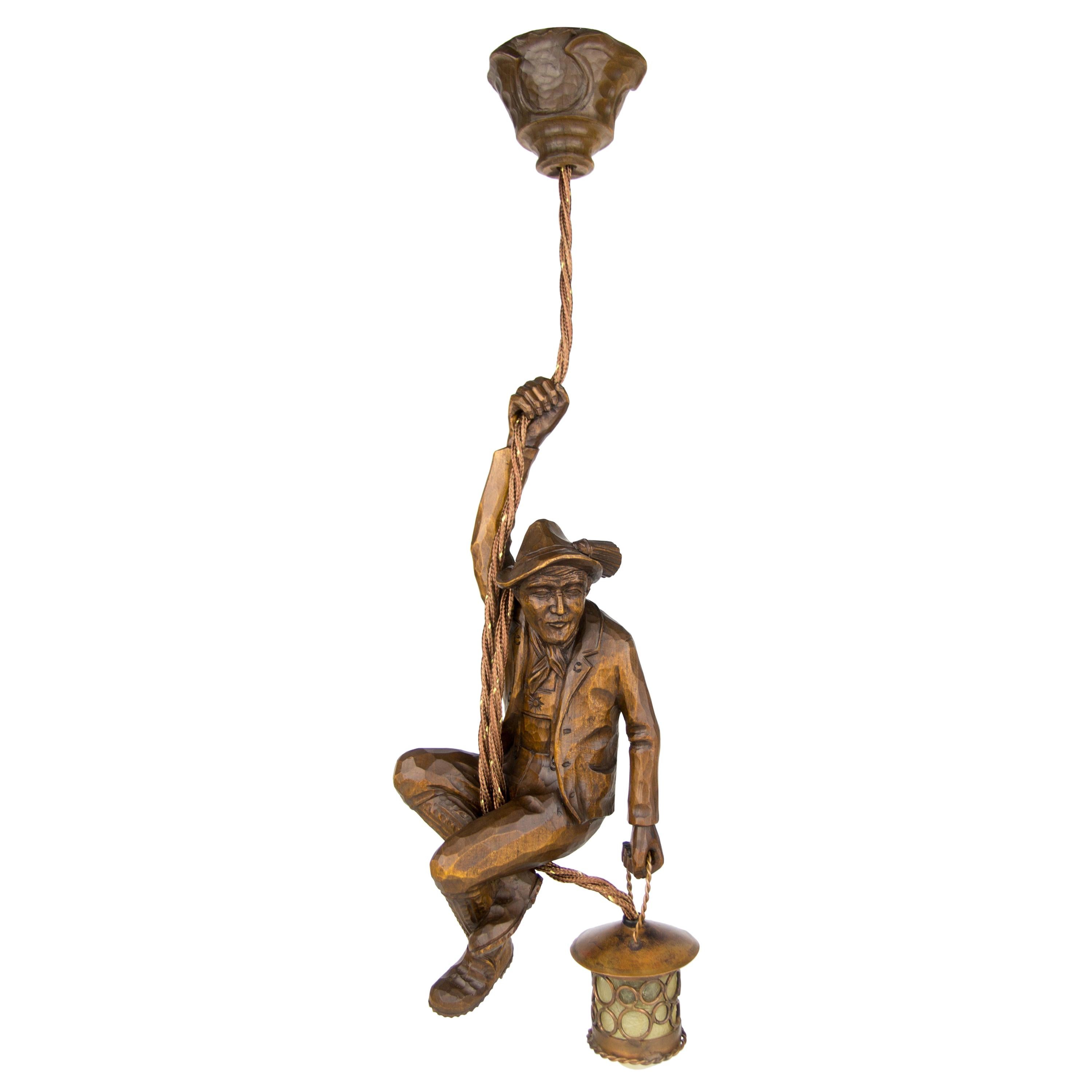 German Pendant Light Hand Carved Wood Figure Mountain Climber with Lantern For Sale