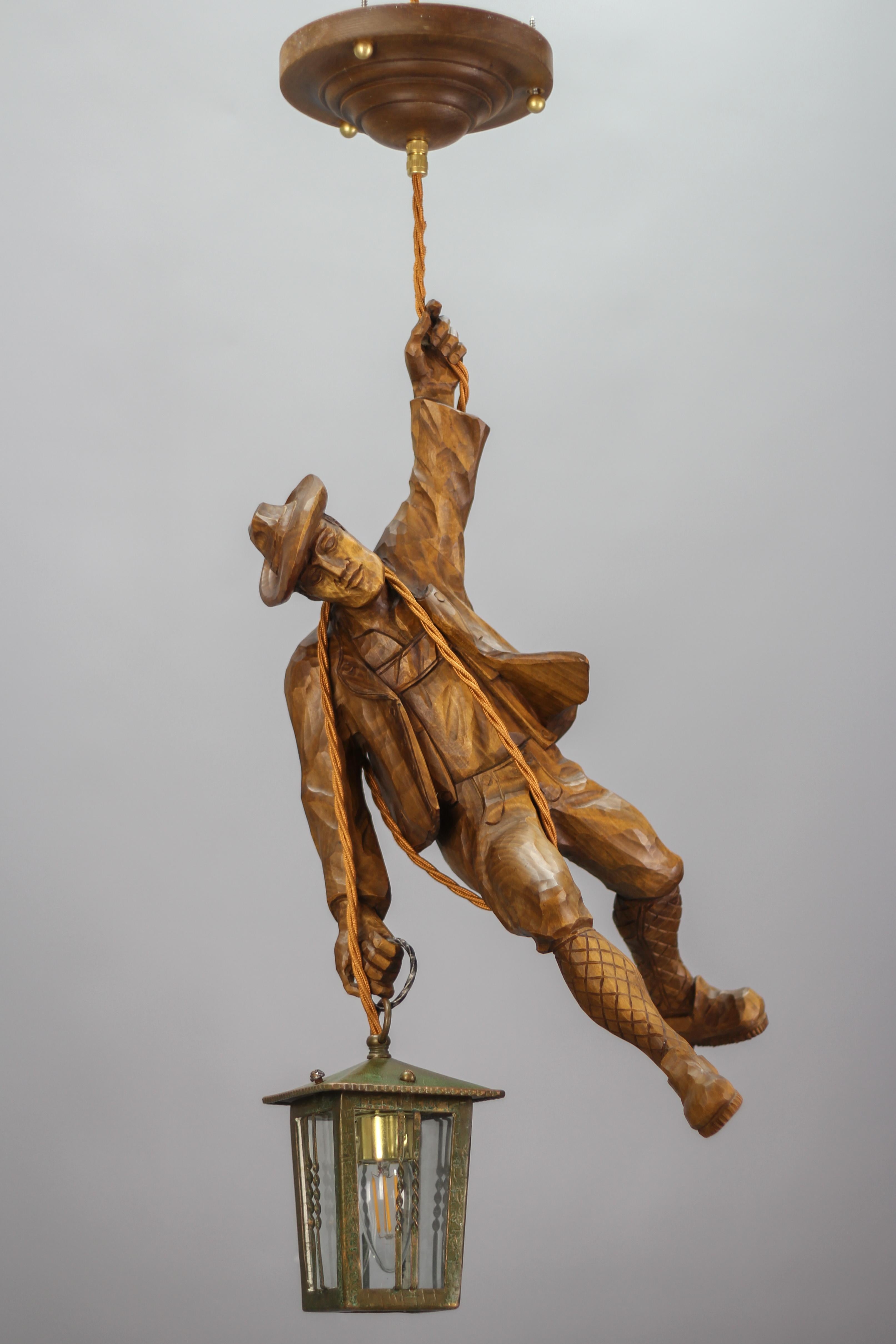 German Pendant Light with a Carved Wooden Figure of Mountain Climber and Lantern 6