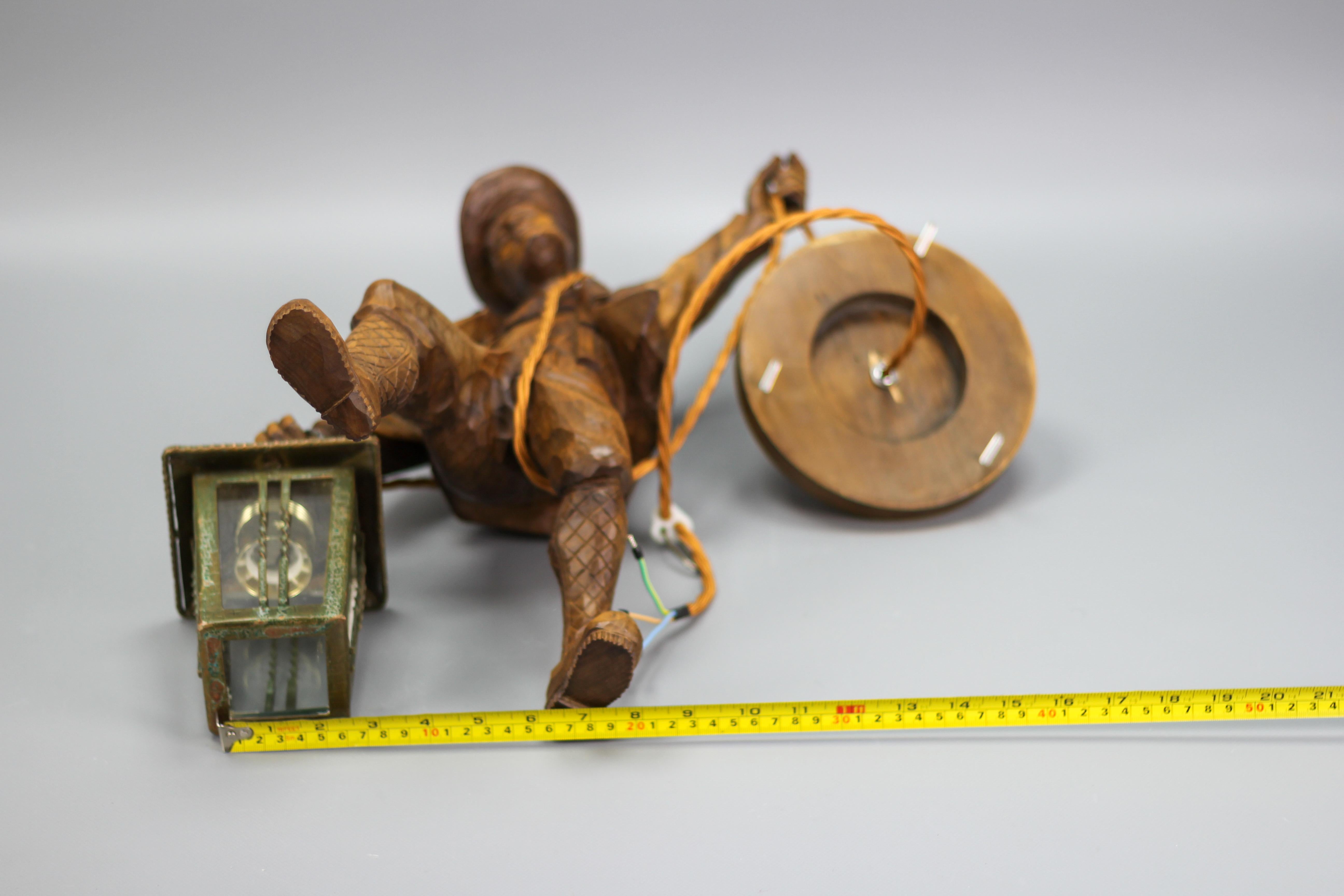 German Pendant Light with a Carved Wooden Figure of Mountain Climber and Lantern For Sale 7