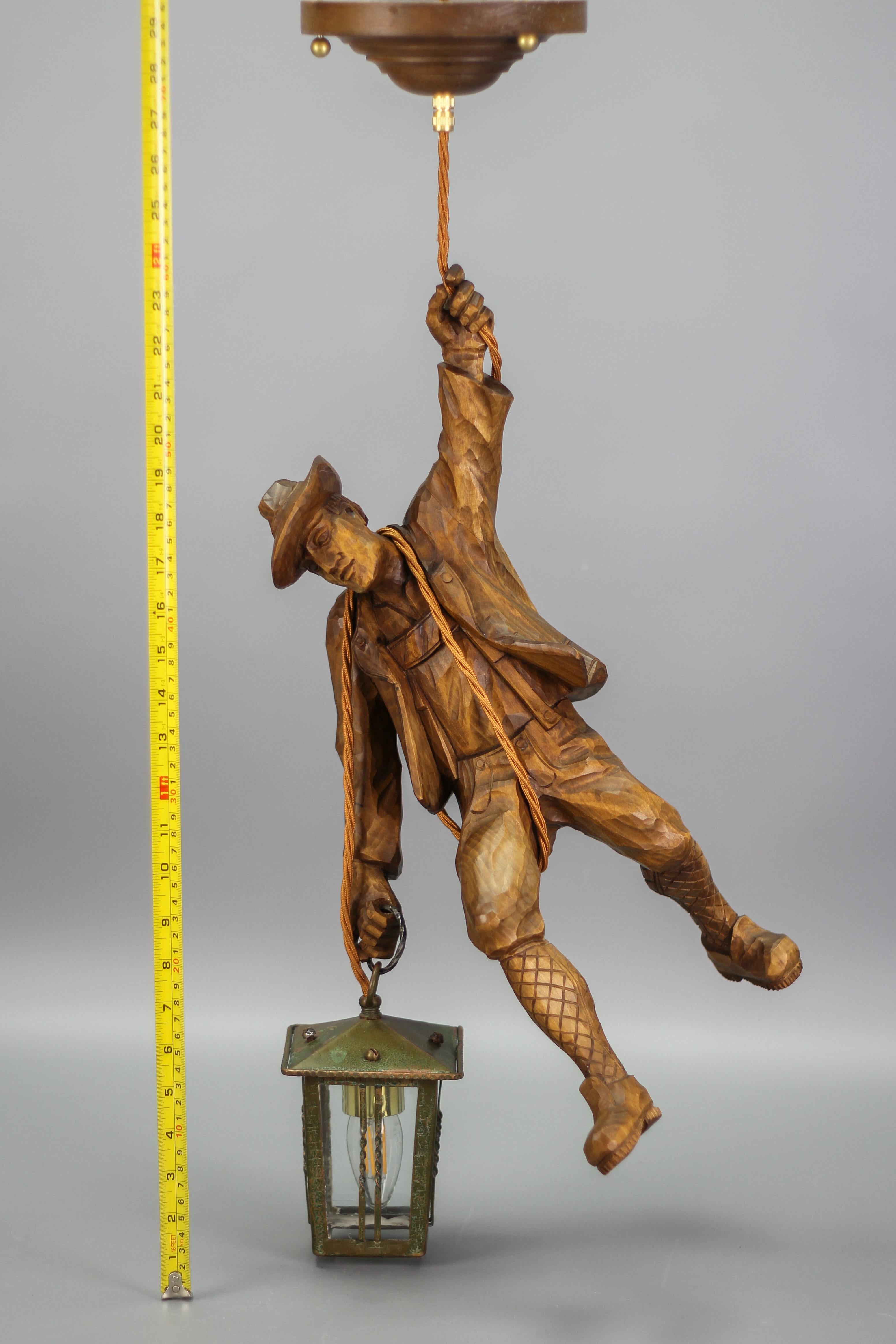 German Pendant Light with a Carved Wooden Figure of Mountain Climber and Lantern 12