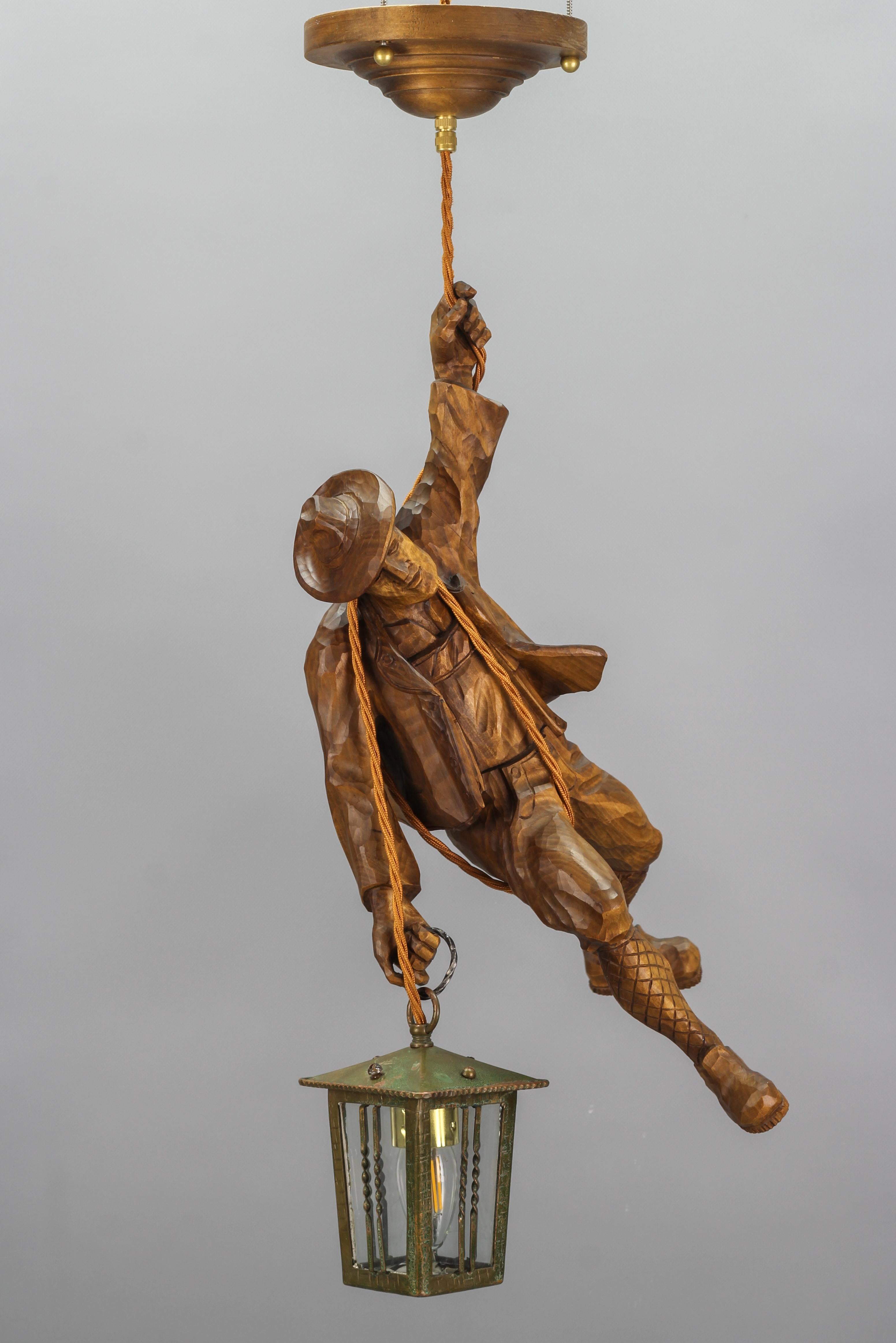 Black Forest German Pendant Light with a Carved Wooden Figure of Mountain Climber and Lantern