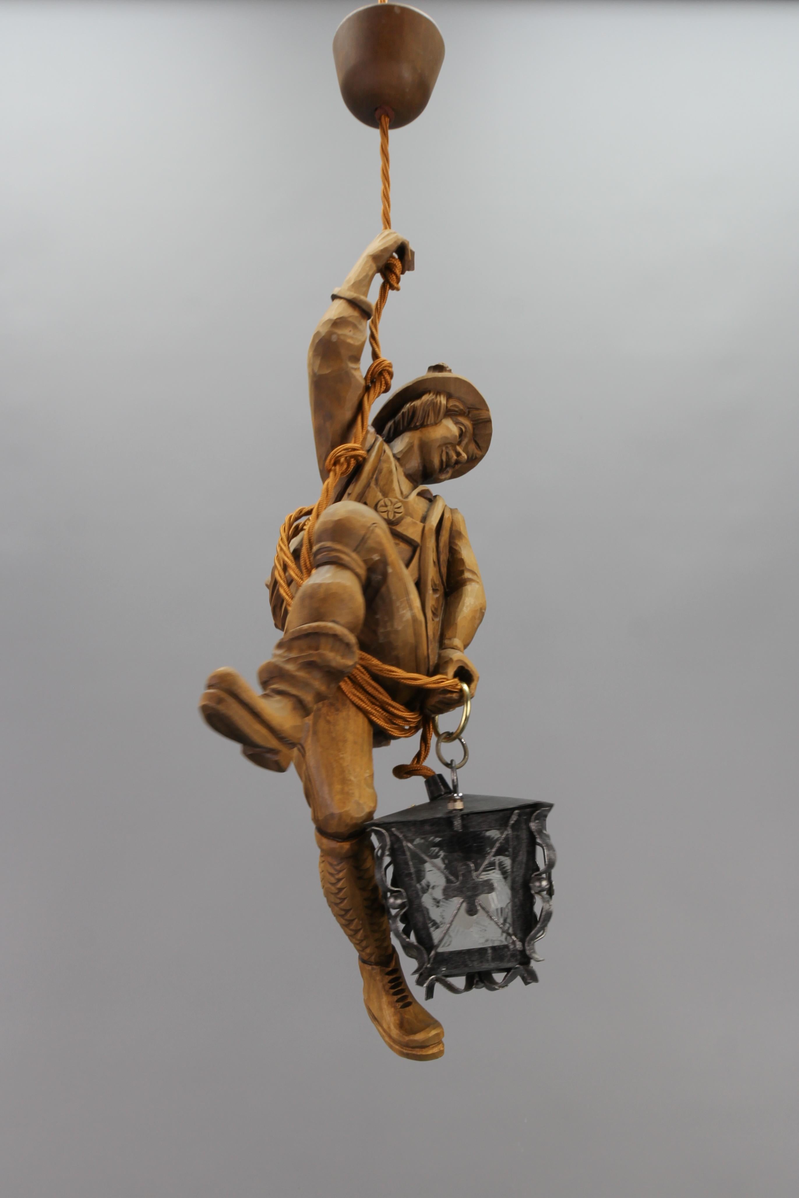 Hand-Carved German Pendant Light with Carved Wooden Figure Mountain Climber and Lantern