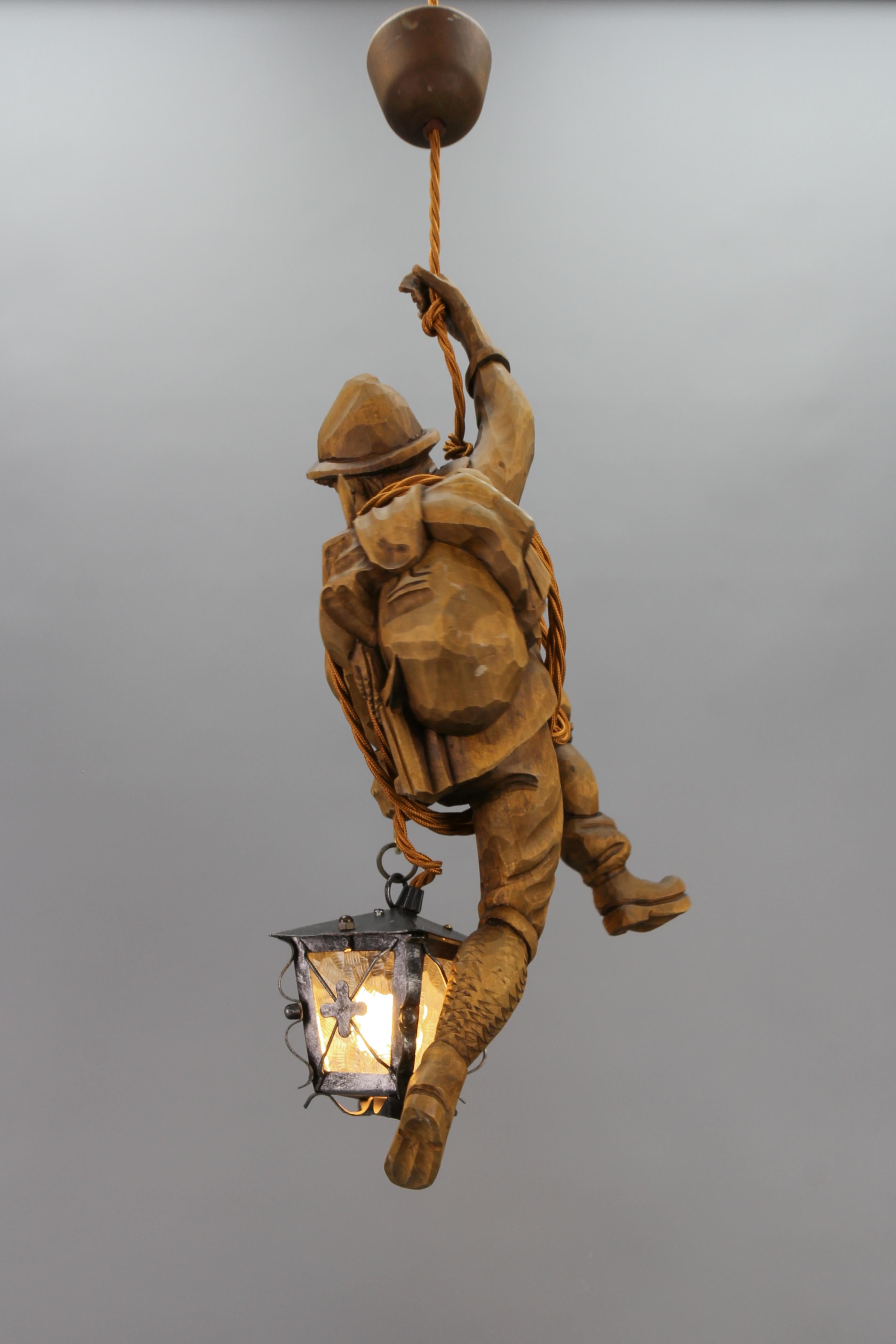 Late 20th Century German Pendant Light with Carved Wooden Figure Mountain Climber and Lantern