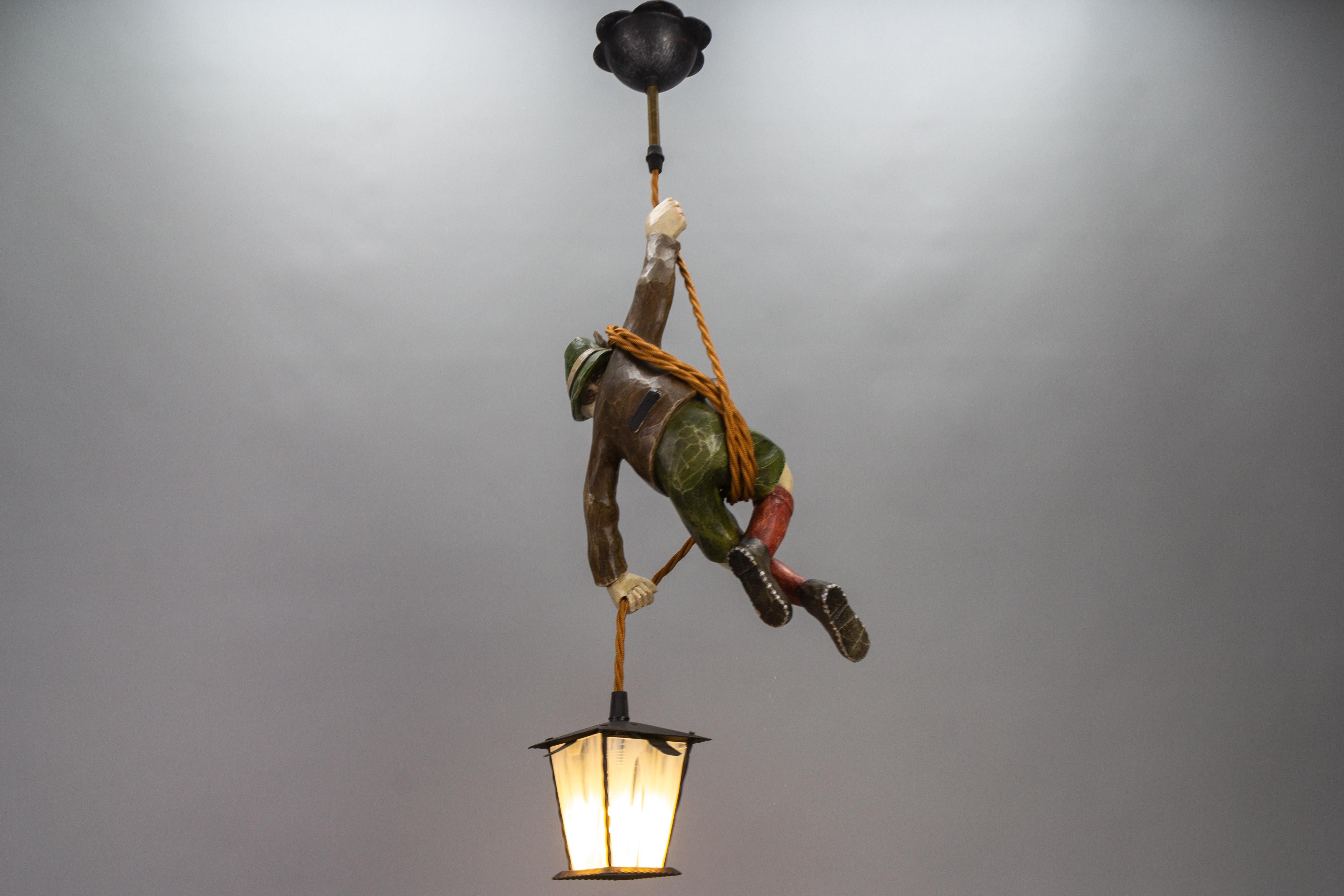 German Pendant Light with Hand Carved Mountain Climber Sculpture and Lantern For Sale 3