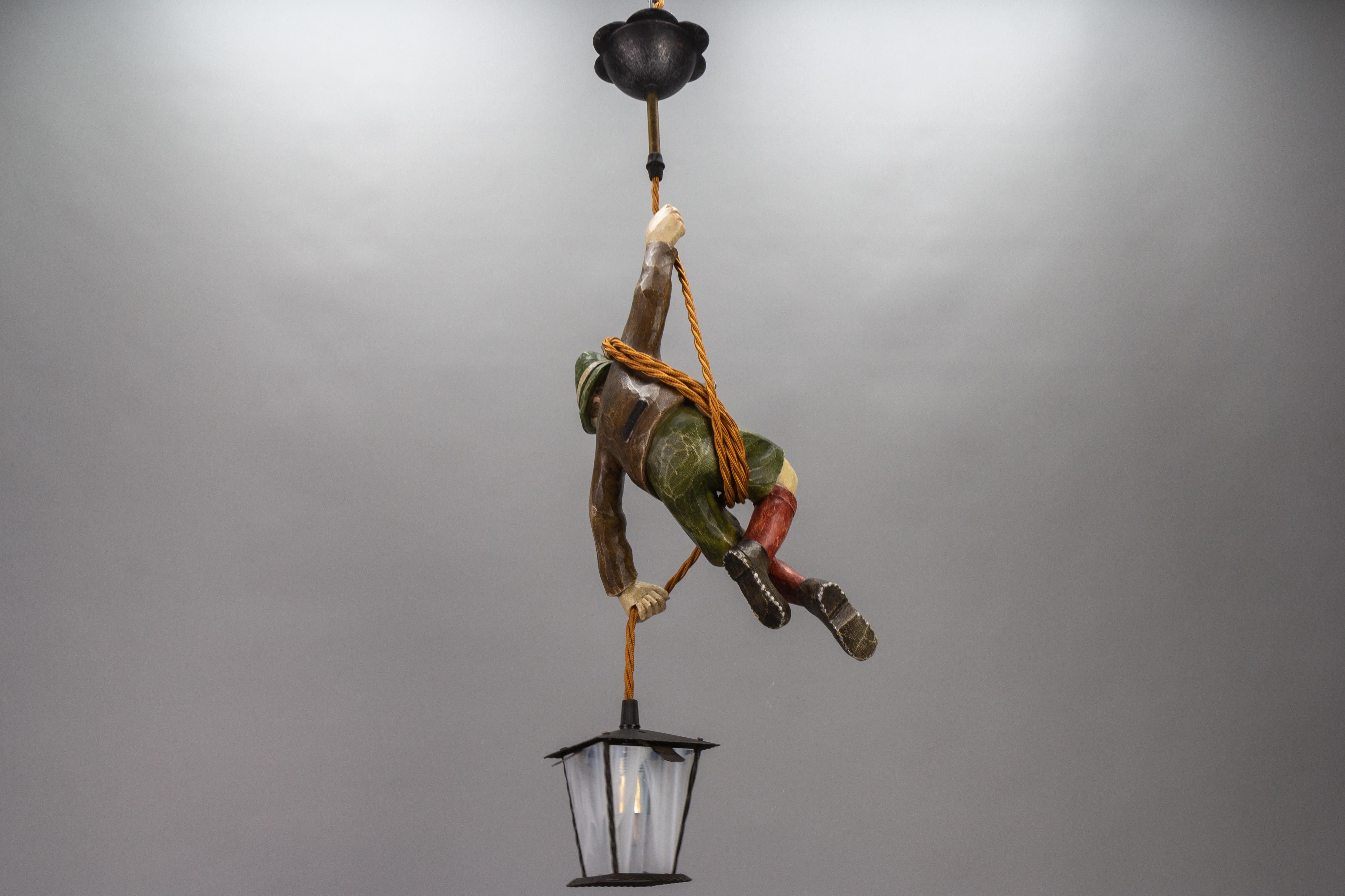 German Pendant Light with Hand Carved Mountain Climber Sculpture and Lantern For Sale 4