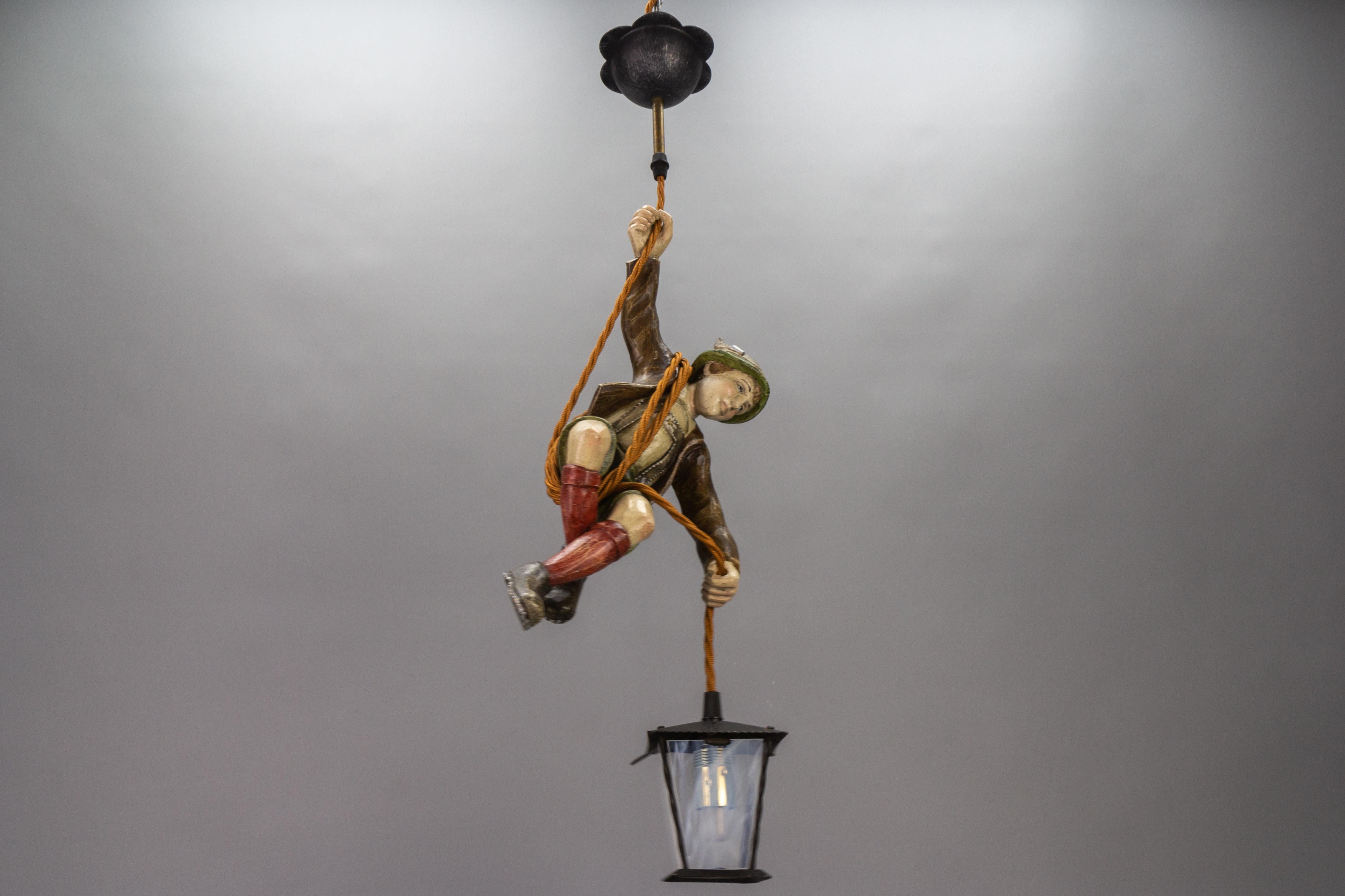 German Pendant Light with Hand Carved Mountain Climber Sculpture and Lantern For Sale 5