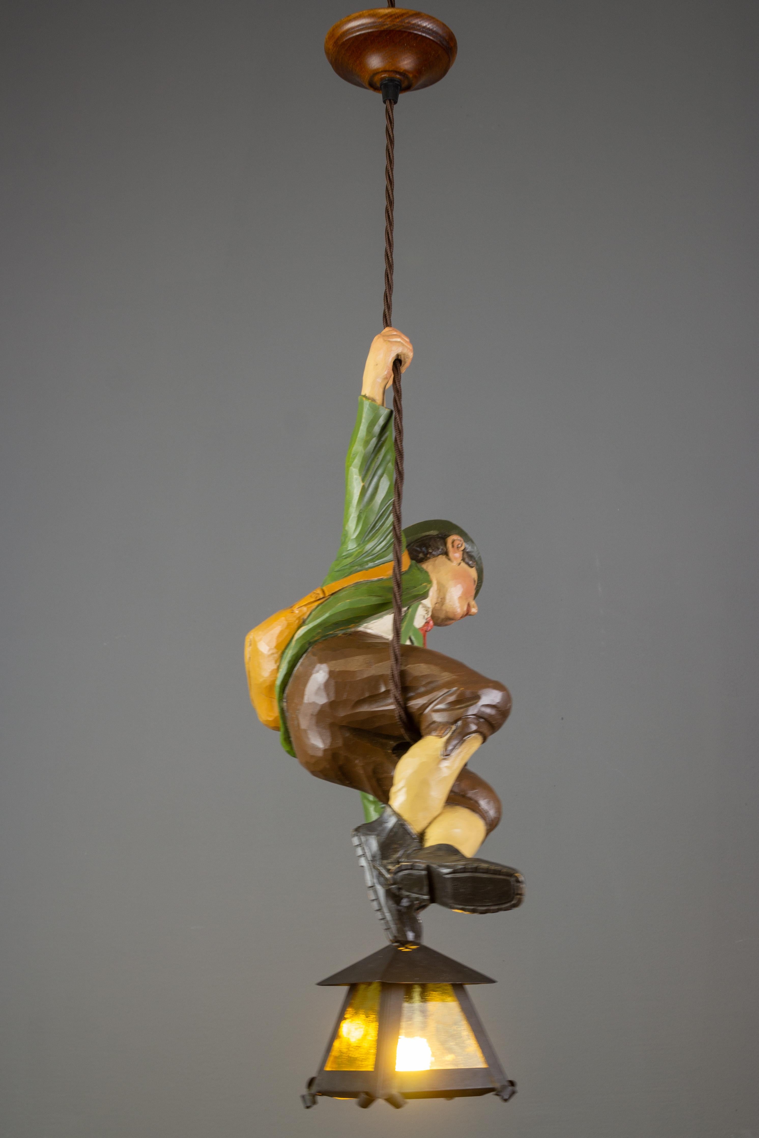 Hand-Carved German Pendant Light with Hand Carved Mountain Climber Sculpture and Lantern