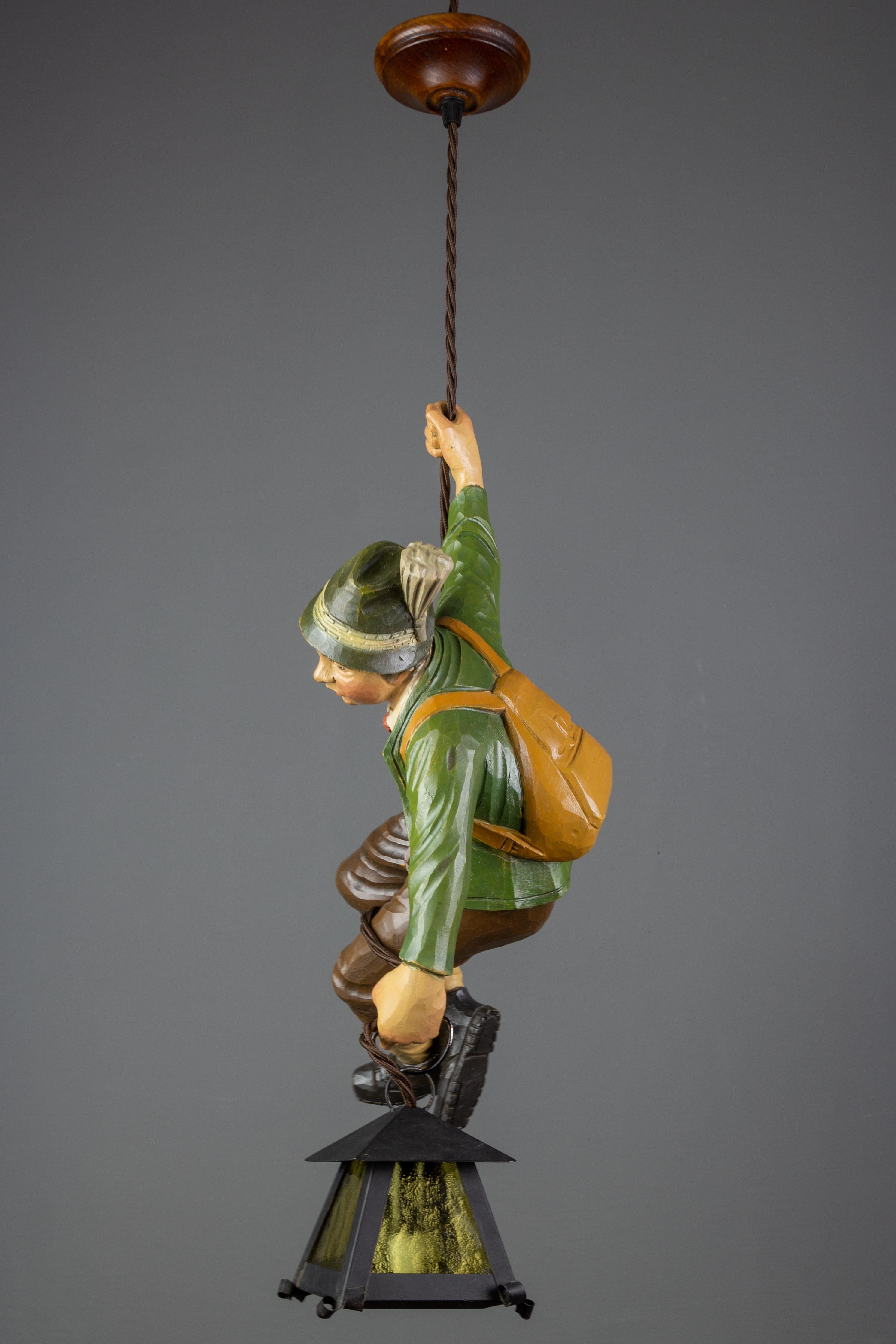 Mid-20th Century German Pendant Light with Hand Carved Mountain Climber Sculpture and Lantern