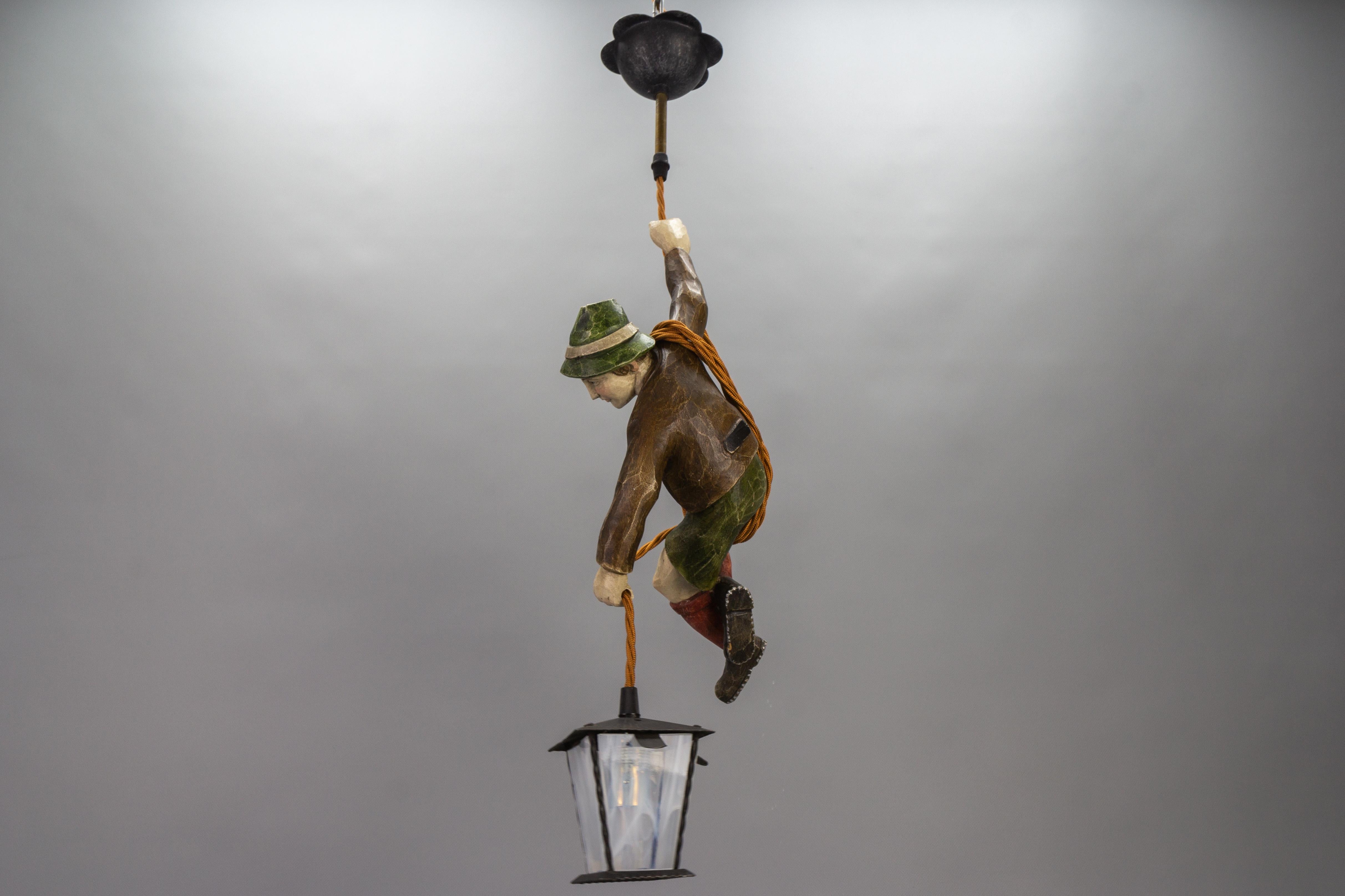 German Pendant Light with Hand Carved Mountain Climber Sculpture and Lantern For Sale 2