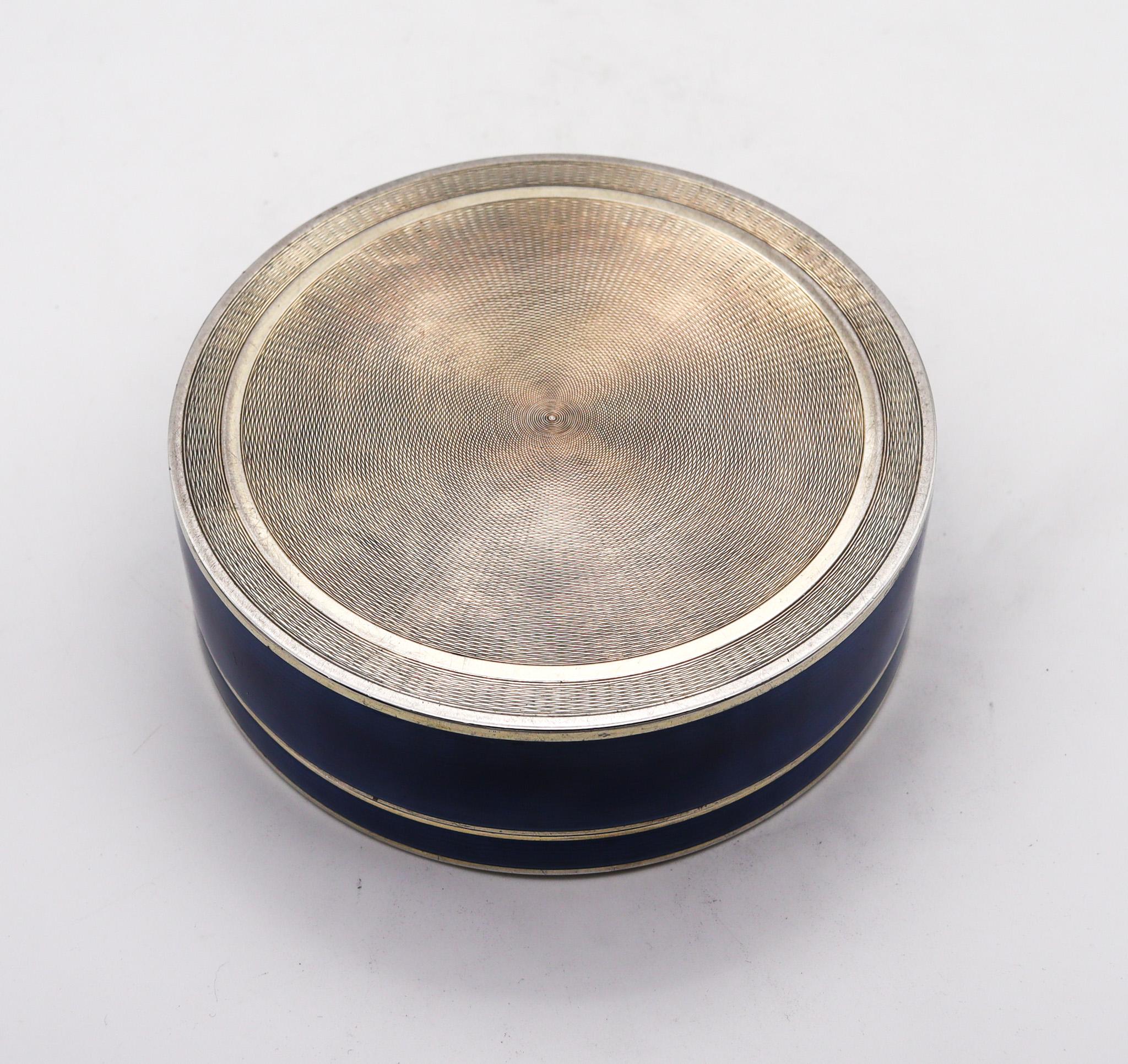 Monumental guilloche enameled round box.

An extraordinary early 20th century guilloche enamel box, created in Pforzheim Germany, with Edwardian neo classical patterns, circa 1910. This beautiful, oversized box was carefully crafted with impeccable