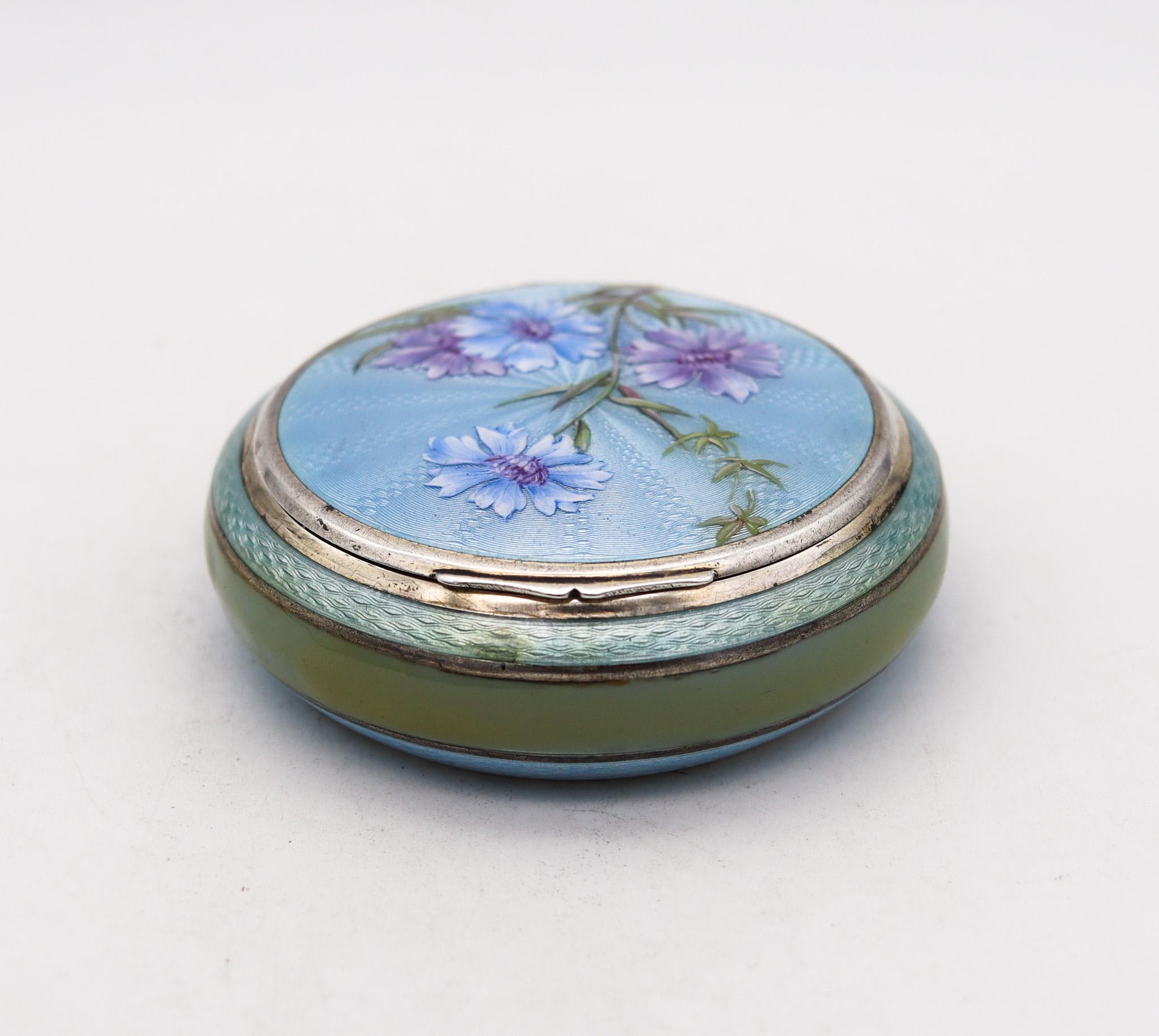 A guilloche enameled round box.

An exceptional early 20th century enameled round box, created in Pforzheim Germany during the art nouveau period, back in the 1915-17. This beautiful box was carefully crafted with impeccable details in solid