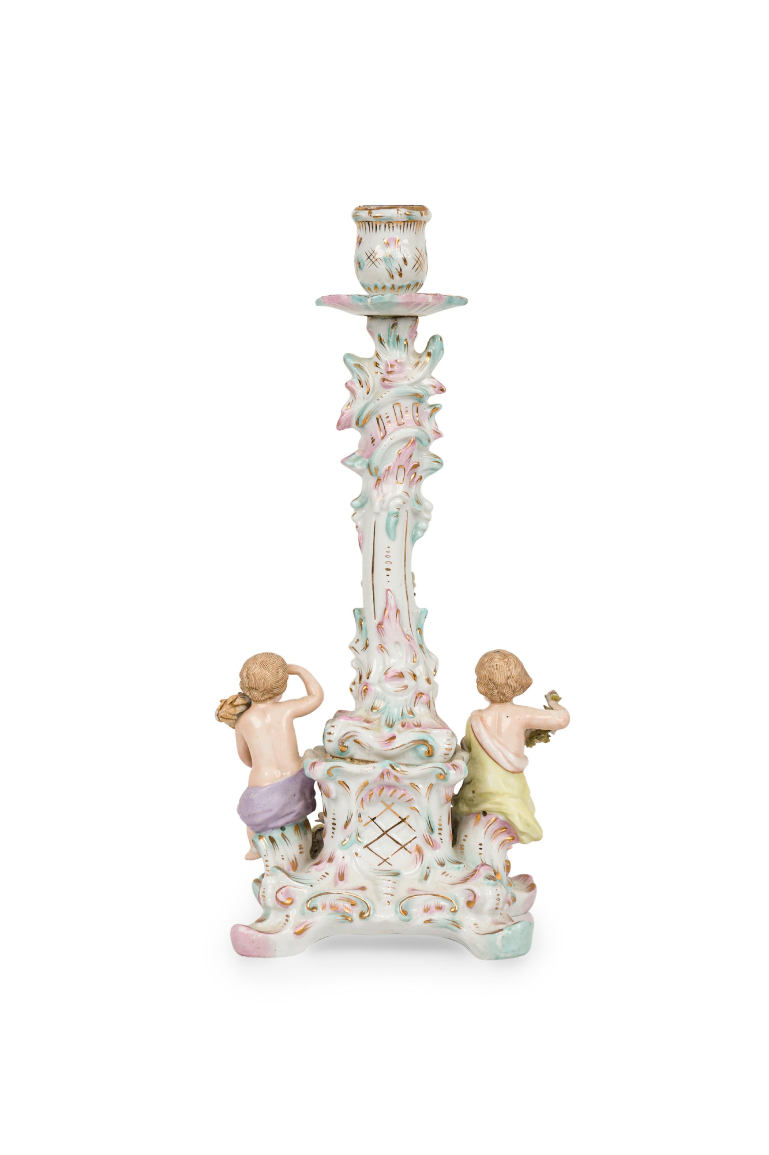 Hand-Crafted German Porcelain Candlestick with Male and Female Figures For Sale