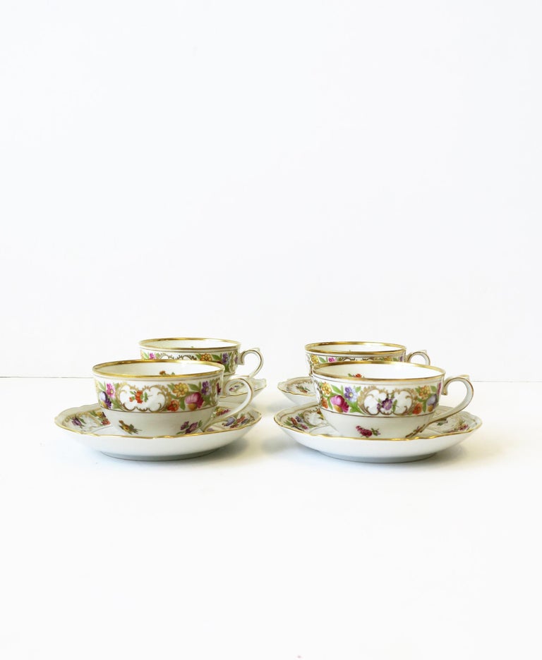 A beautiful set or four (4) German porcelain coffee or tea cup and saucers by Schumann Arzberg, Bavaria, Germany, circa mid-20th century. Pieces are in the Empress Dresdner flowers pattern design as marked on bottom. Marker's mark on bottom as well.
