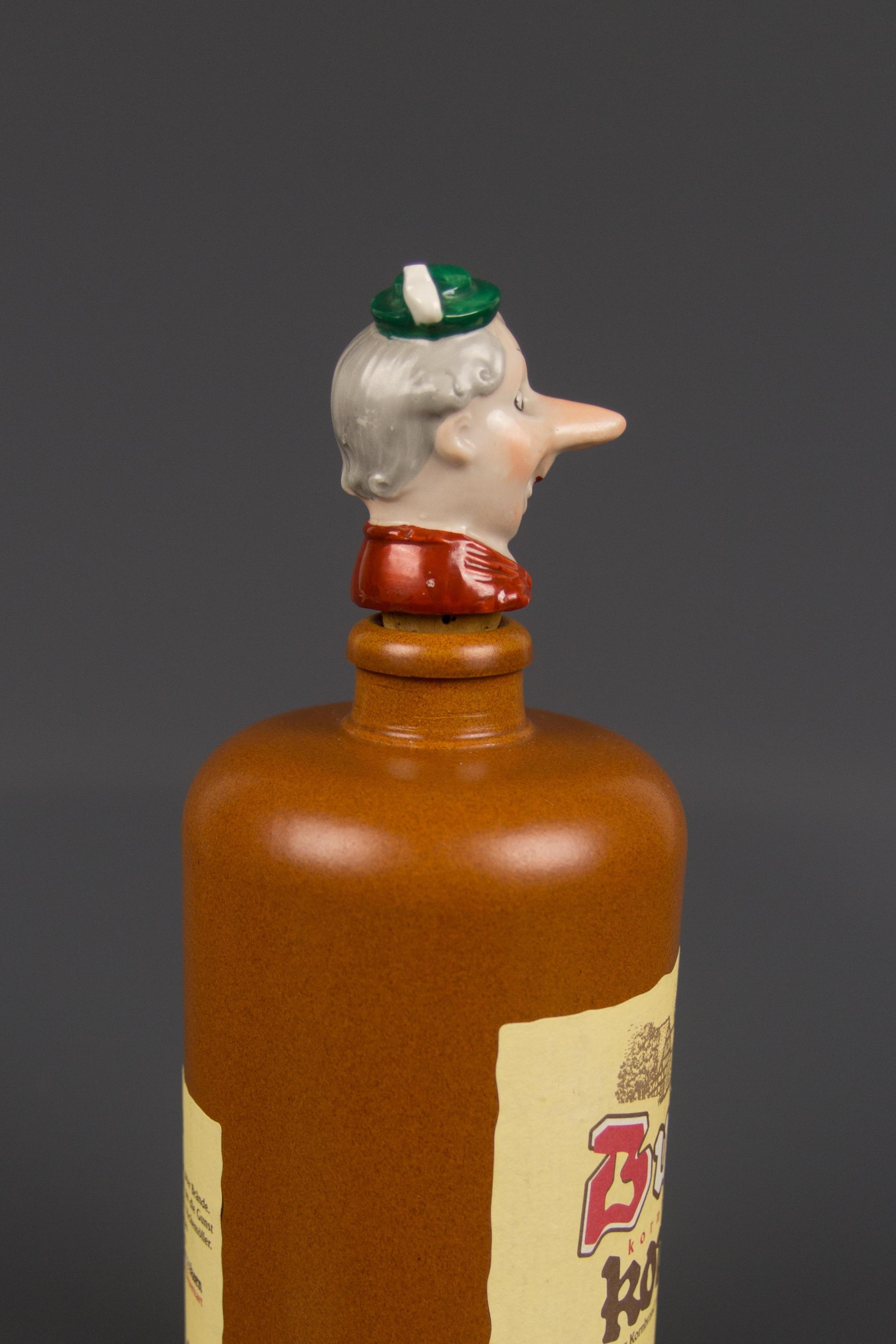 Adorable porcelain cork pourer or bottle stopper. It depicts a cheerful and beautifully painted man with a small green hat and red neckerchief, Germany, 1930s.
Ideal decoration - pourer or bottle stopper. Great idea to surprise your guests or a